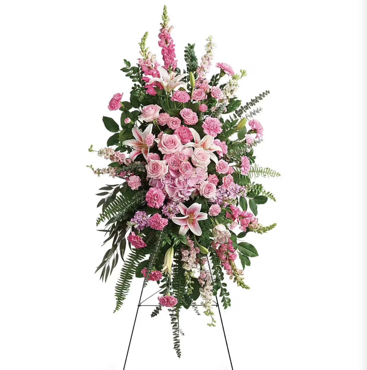 Tall pink floral standing spray on an easel
