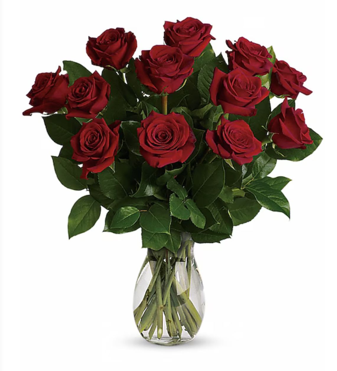 Bouquet of red roses in a clear glass vase