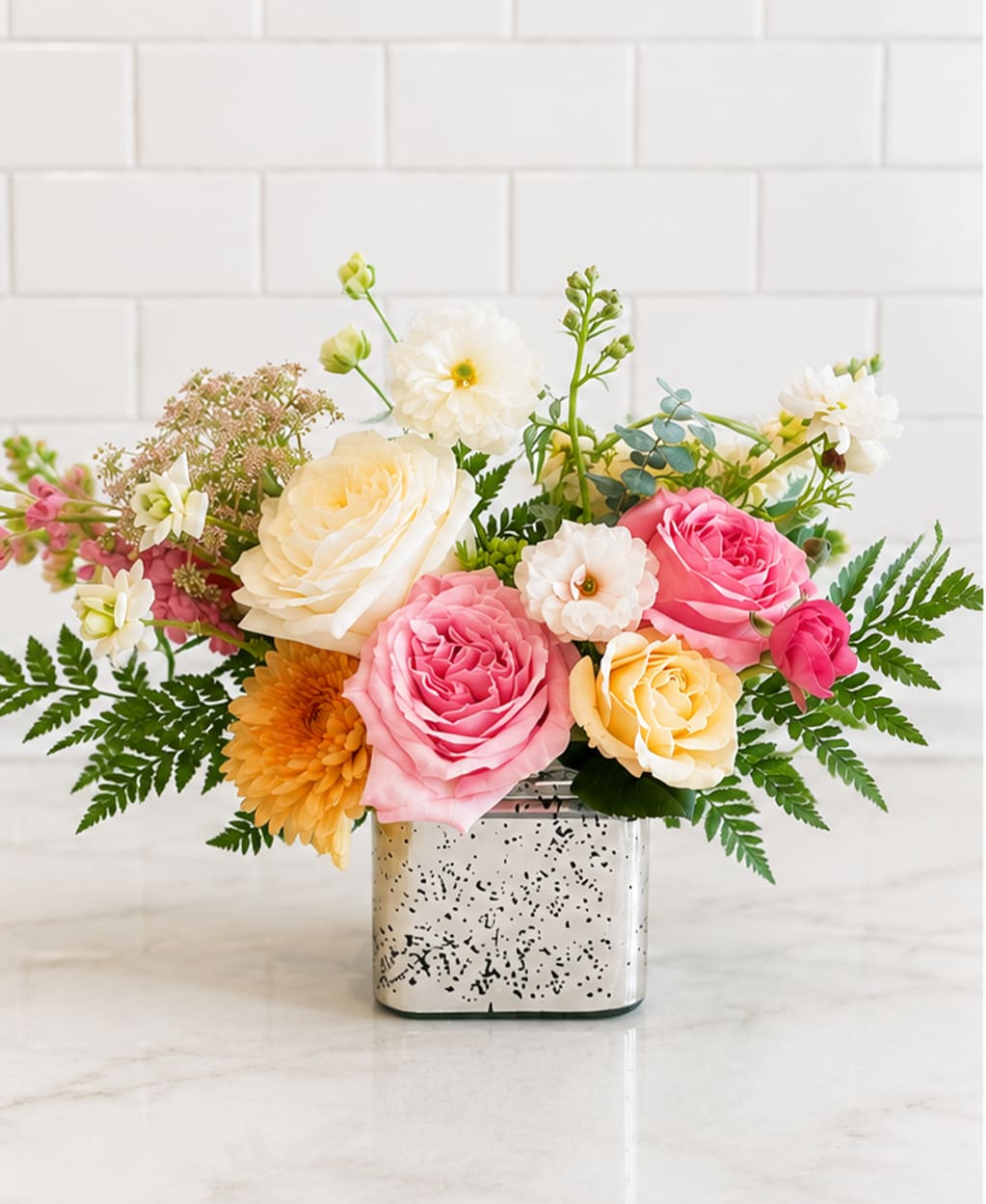 New Beginnings (Designer's Choice) - Celebrate new beginnings with joyful, seasonal blooms thoughtfully designed to encourage, inspire, and brighten the year ahead. A meaningful gift for teachers, students, and anyone starting a new chapter.
