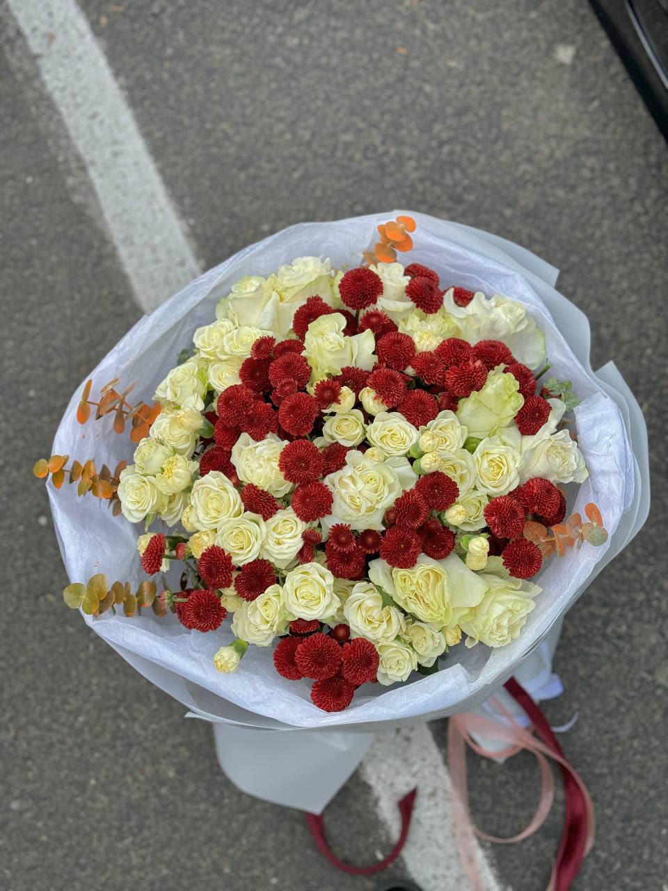 Autumn bouquet - Autumn bouquet of brown chrysanthemums, white single rose and white bush rose with orange eucalyptus