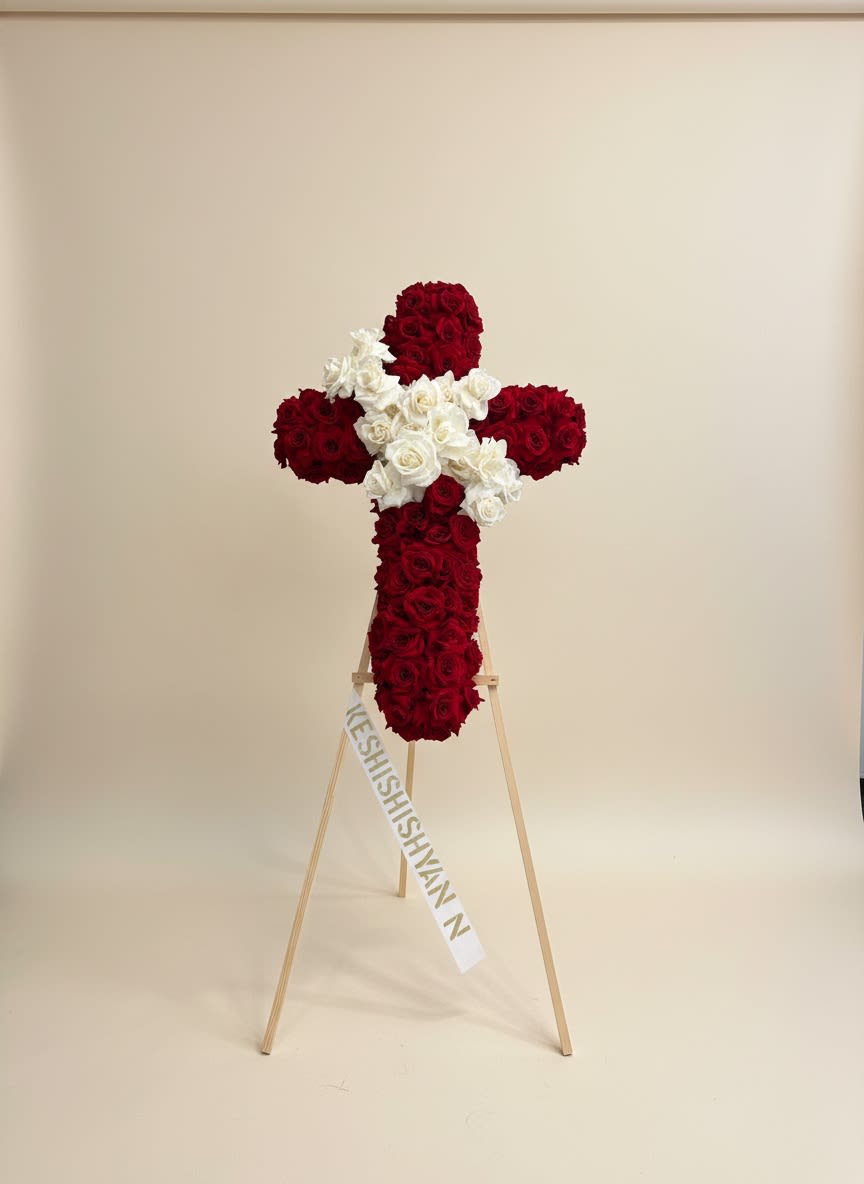 Love Red  - Invite beauty to your love ones with elegant funeral arrangement, presented in a wooden easel. This funeral arrangement features red &amp; white roses all around.