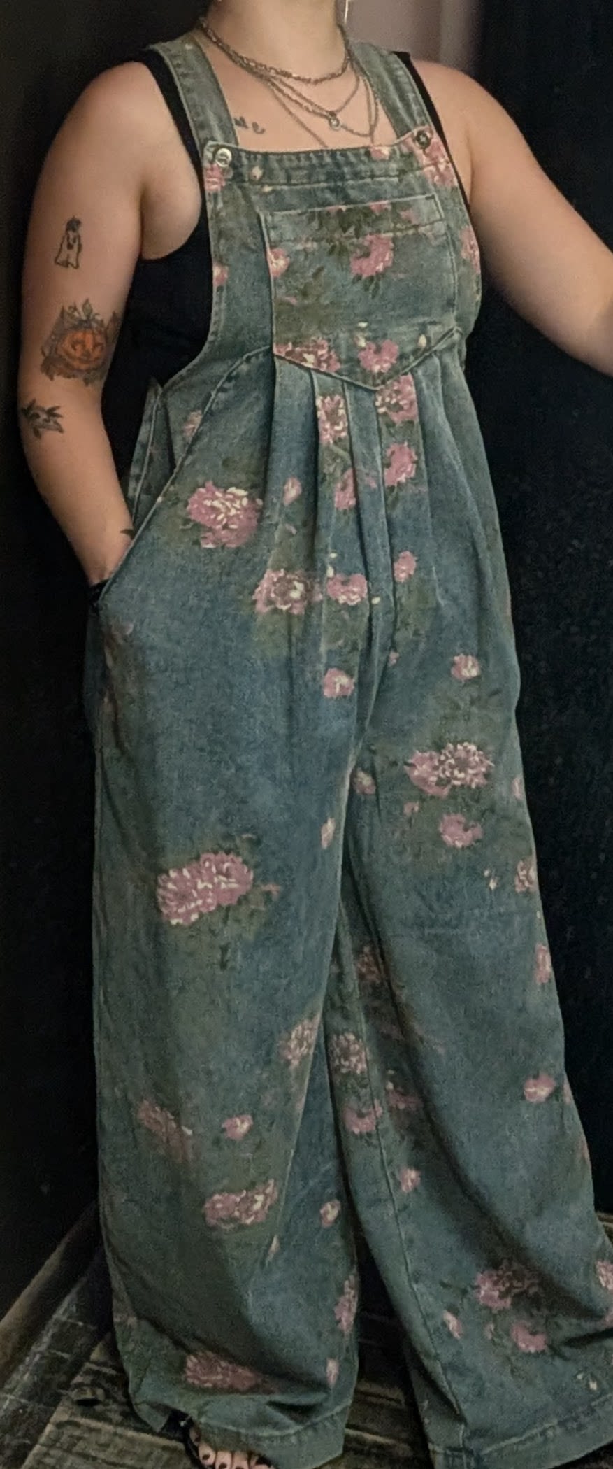 Light Denim Floral Overalls - Oversized flare leg denim overalls with a front pouch, a back pocket, and pants pockets. Available in size S,M,XL.