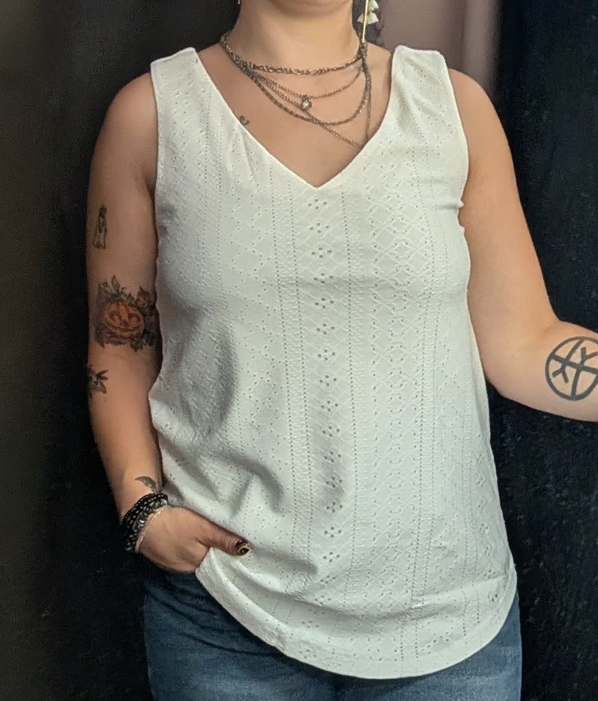 White Tank Top - White Tank top with a patterned top layer and solid inner layer. Available in sizes S,M,L,XL.