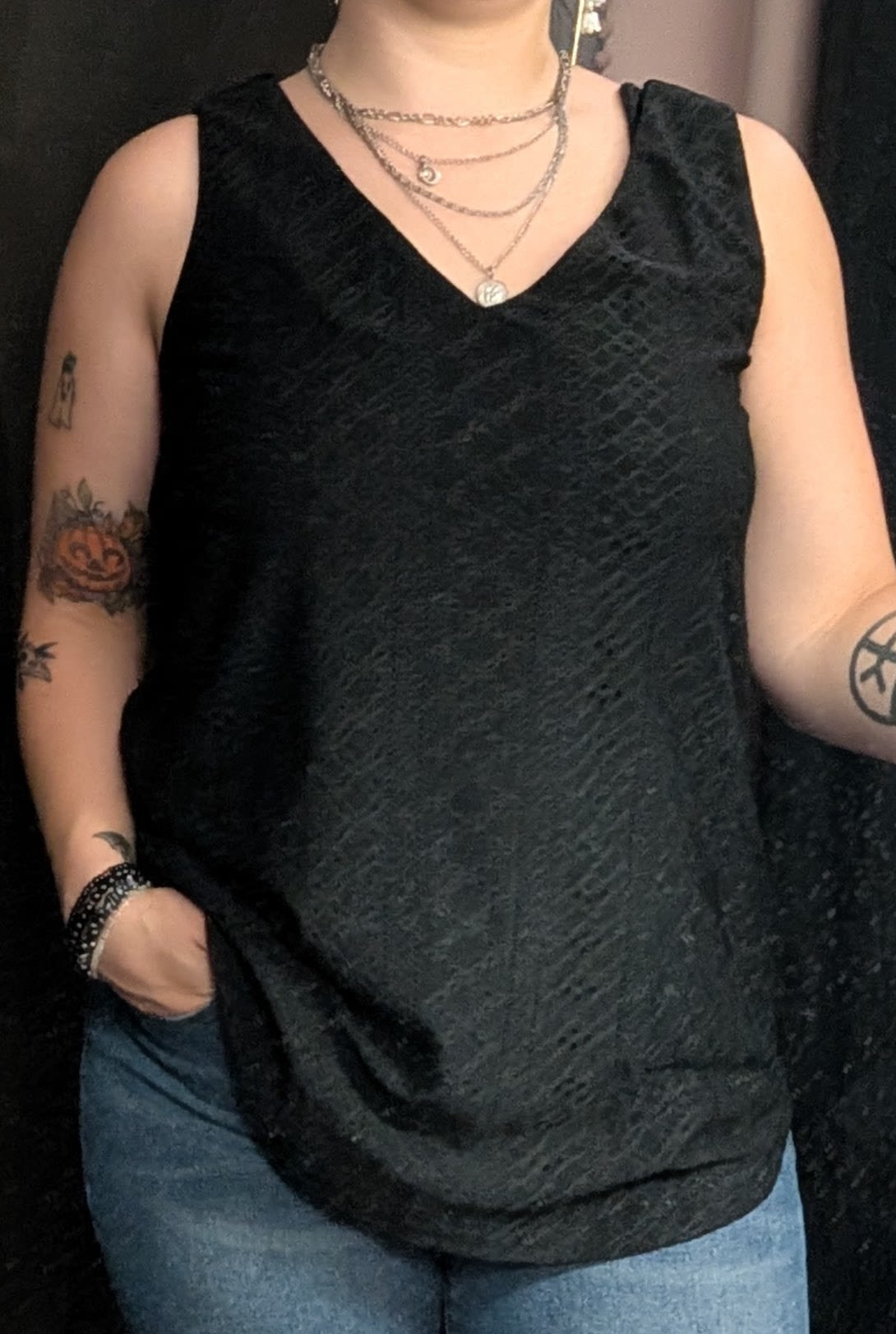 Black Tank Top - Black tank top with a patterned top layer and solid inner layer. Available in sizes S,M,L,XL.