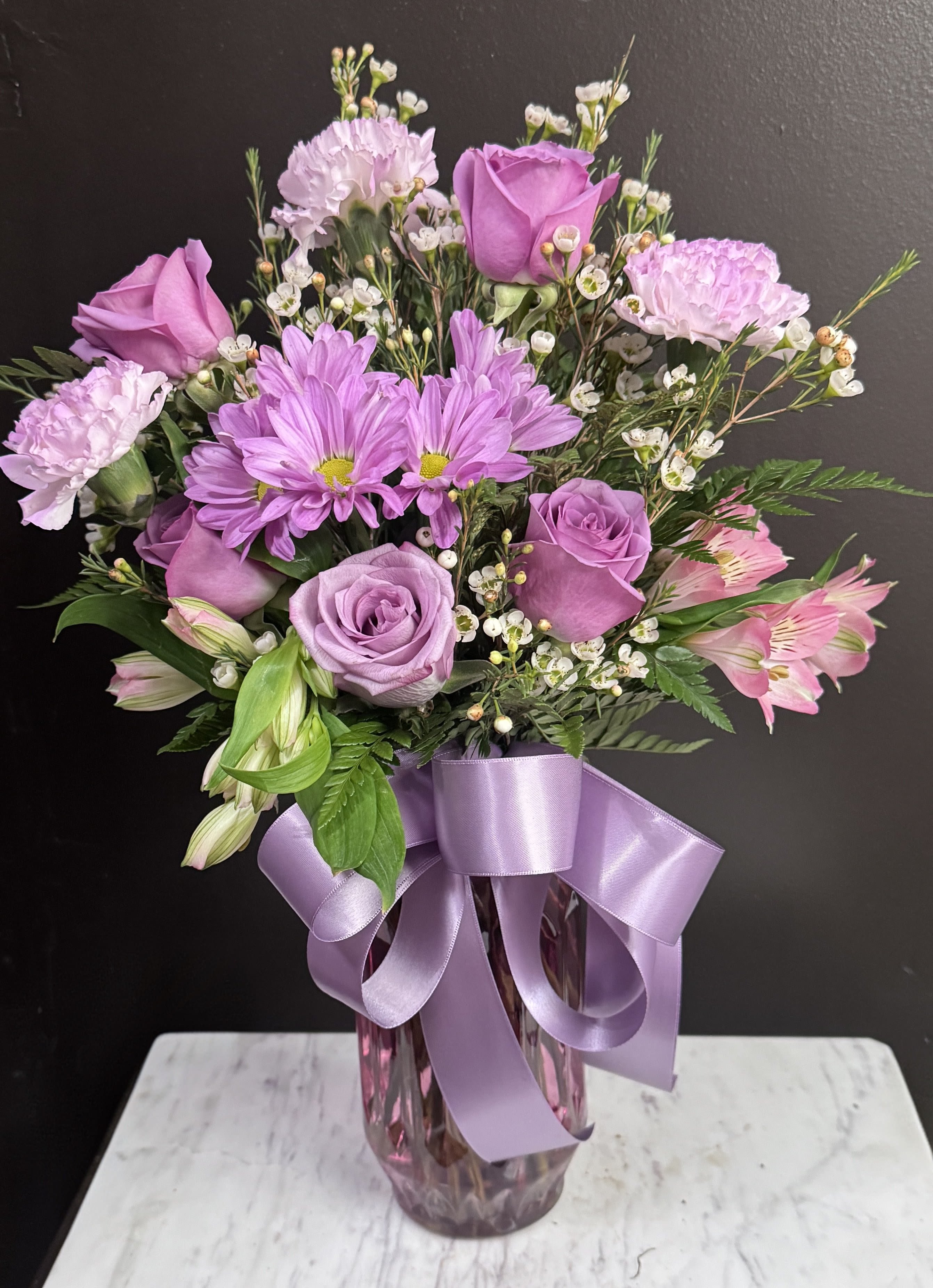 Purple Passion - Purple white and pink in a clear glass vase.