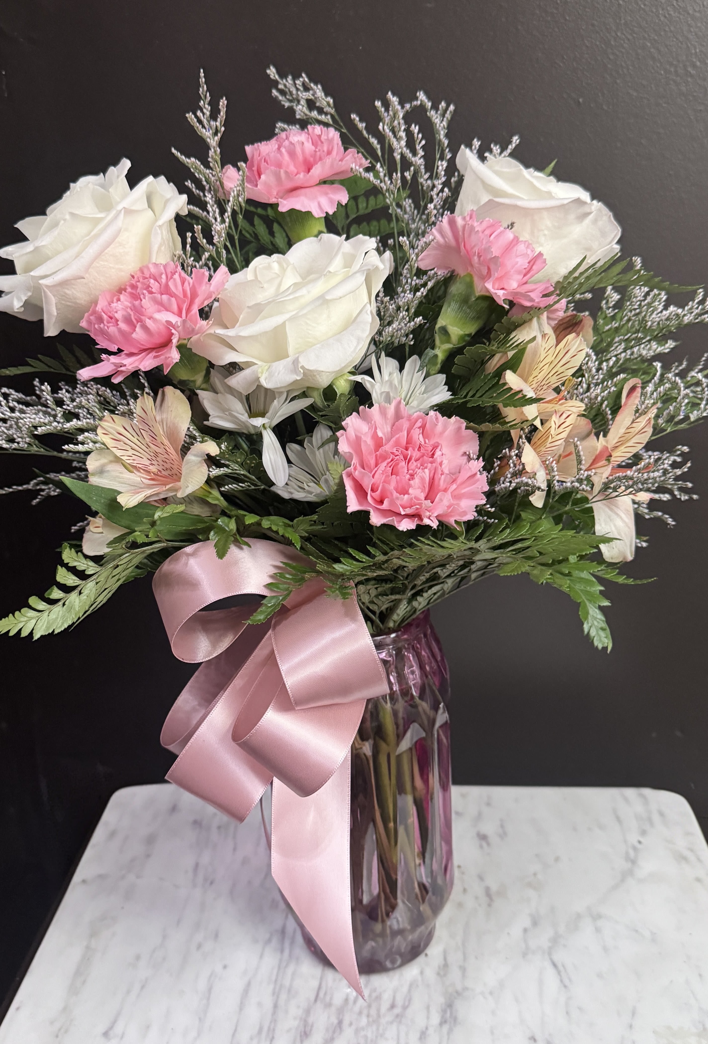Cupid's Choice - Pink and white blooms in a hot pink gem shape vase.