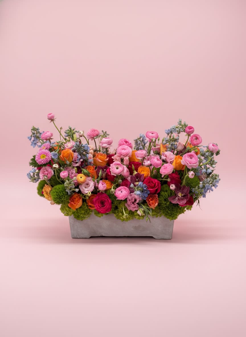 Spring blossoms  - Embrace the essence of spring with our vibrant "Spring Symphony Arrangement"! This grand display is a breathtaking celebration of the season, featuring an exquisite mix of all your favorite spring blooms in a kaleidoscope of colors. From cheerful daisies and radiant tulips to fragrant hyacinths and delicate ranunculus, each flower is thoughtfully selected to create a lively and harmonious composition. 