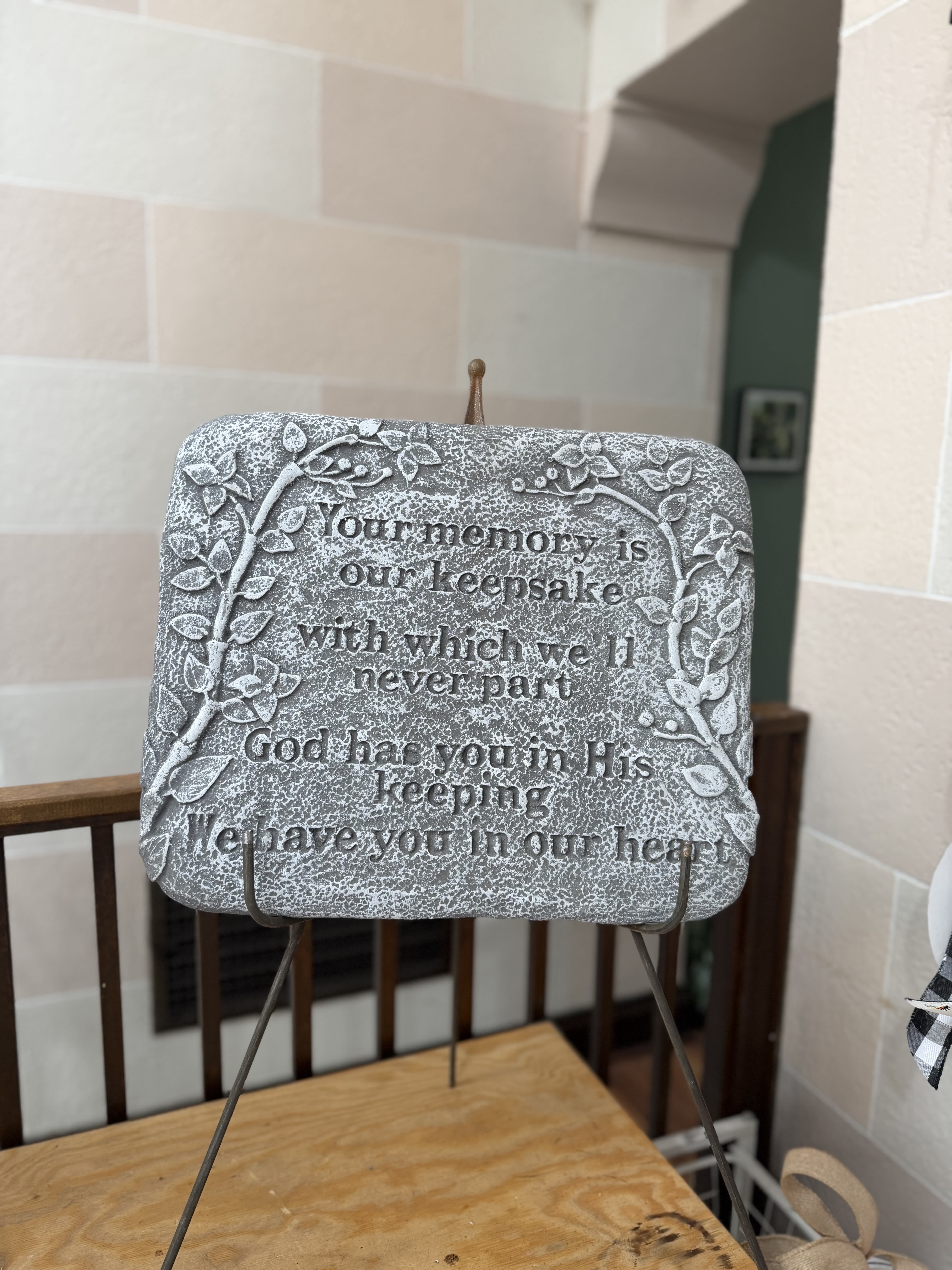 "In Our Heart" Stone  - A concrete stone with a stand with vines.  Stone Reads: "Your memory is our keepsake with which we'll never part God has you in His keeping we have you in our heart". 