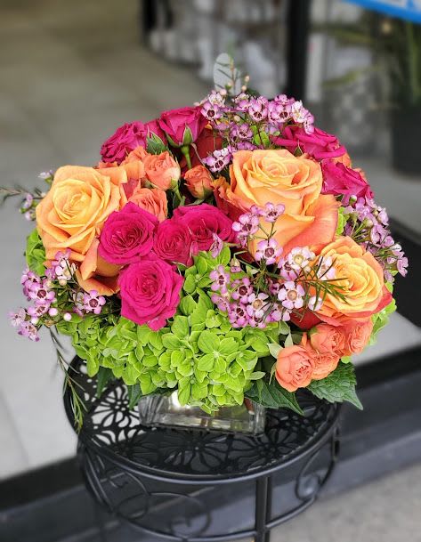 Screaming summer  - Bright mixed bouquet with sunflowers, peach/blush roses and pale green hydrangeas with airy filler.