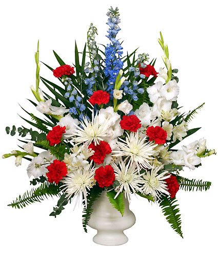 Patriotic Memorial - Acrylic Urn Container, Foliage: Sword Fern, Eucalyptus, Teepee, Blue Delphinium, White Gladiolus, Red Carnations, White Fuji Mums.