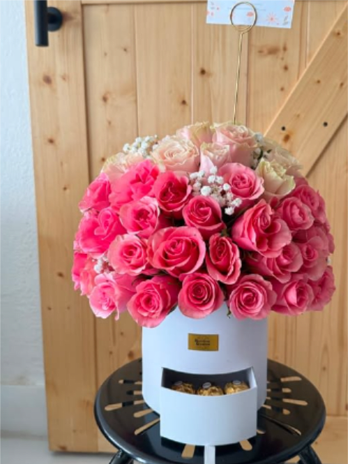 75 Premium Roses &amp; Chocolates Luxury Bouquet - Make an unforgettable statement with this breathtaking bouquet of 75 premium roses, beautifully paired with gourmet chocolates and wrapped in elegant luxury packaging. Designed to celebrate love and life’s most meaningful moments, this stunning arrangement is a timeless expression of romance, appreciation, and joy.  The rose color is fully customizable, allowing you to choose the perfect shade to match your occasion or personal style. Whether it’s classic red, elegant white, soft pink, vibrant yellow, or any available color, we’ll create a bouquet that’s uniquely yours. Perfect for anniversaries, birthdays, proposals, Valentine’s Day, graduations, or any celebration deserving of a grand gesture. Handcrafted by our expert florists using the freshest premium roses for an unforgettable presentation.  Please Note: Rose colors are available by customer choice and subject to seasonal availability. Chocolate selection and wrapping style may vary while maintaining the overall luxury design and premium quality of the bouquet.