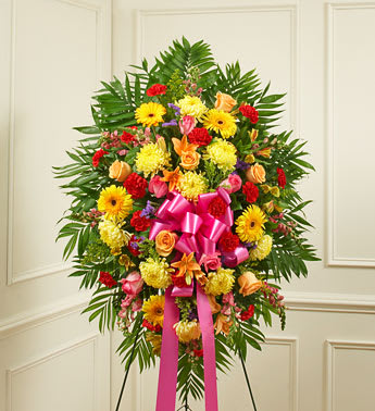 Deepest Sympathies Bright Standing Spray - Product ID: 91390   Crafted from fresh and brightly colored blooms, our heartfelt standing spray is a beautiful symbol of your love and support. Gathered with roses, lilies, Gerbera daisies, mums, snapdragons, alstroemeria, carnations and more, let it convey your deepest sympathies and let them know theyâre in your thoughts. Bright arrangement of peach and hot pink roses, lilies, Gerbera daisies, mums, snapdragons, alstroemeria, carnations and more An appropriate expression of your sympathy for family, friends and business associates to send directly to the funeral home Our florists use only the freshest flowers available so colors and varieties may vary Large measures approximately 56"H x 42"L without easel Medium measures approximately 46"H x 38"L without easel Small measures approximately 42"H x 32"L without easel Easel may not be available in all areas