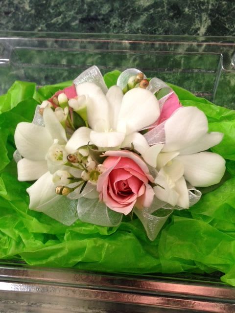 Pink rose bouquet with white calla lilies and ribbon wrap