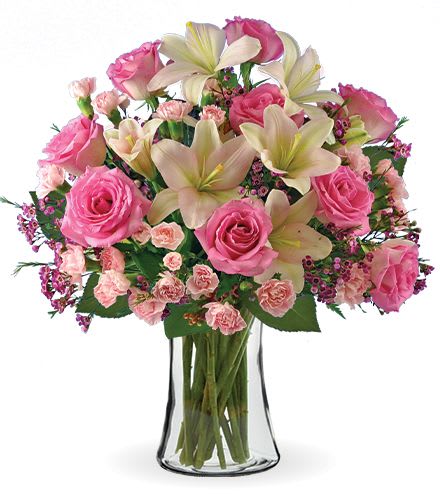 Pink Celebration - (ONE-SIDED) A beautiful blend of roses and lilies, creating a soft, romantic arrangement perfect for celebrating life’s sweetest moments.