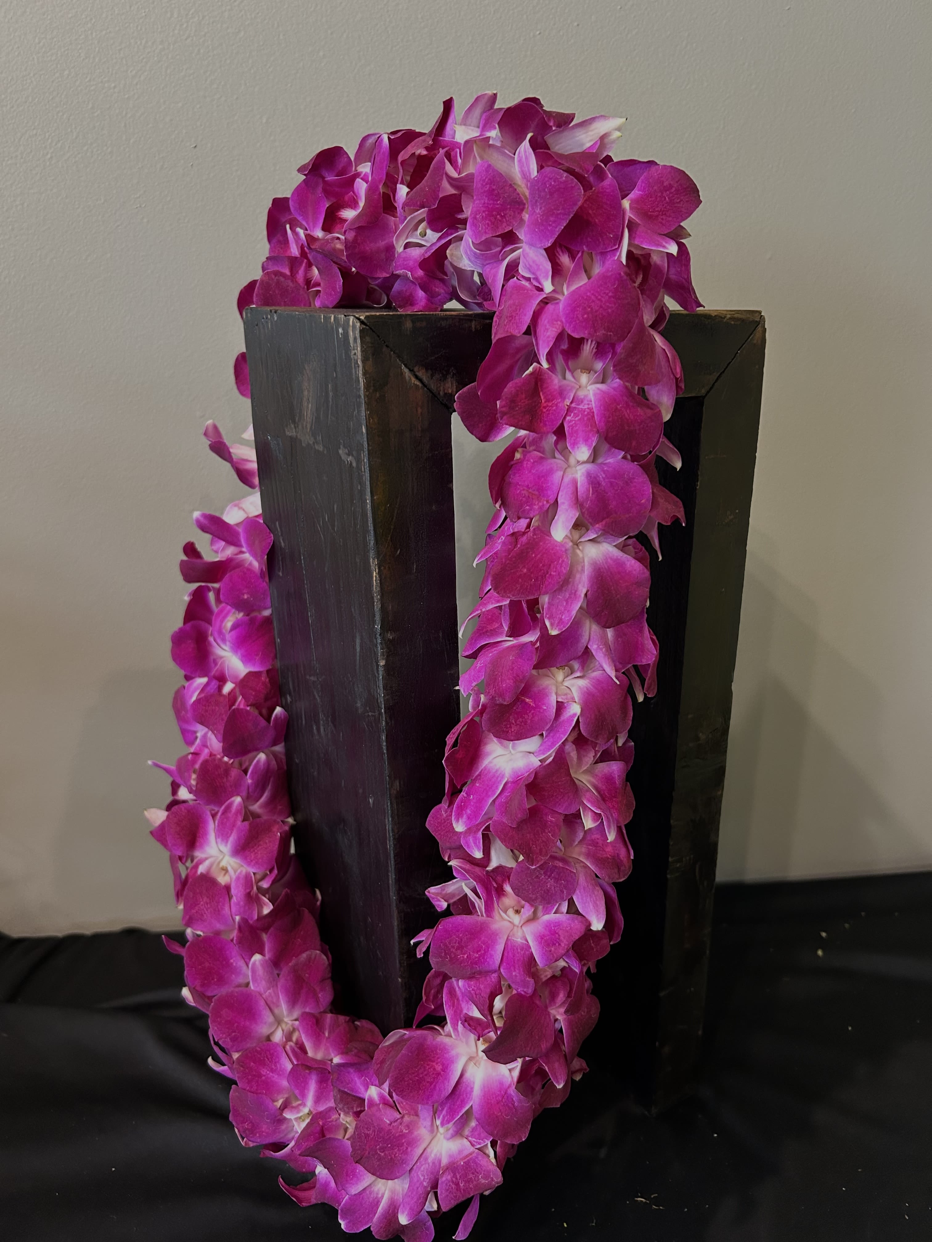 Purple Double Orchid Lei - Preorder a Lei for your upcoming graduation or ceremonial event with a freshly prepared double dendrobium orchid in the stunning purple shade! 
