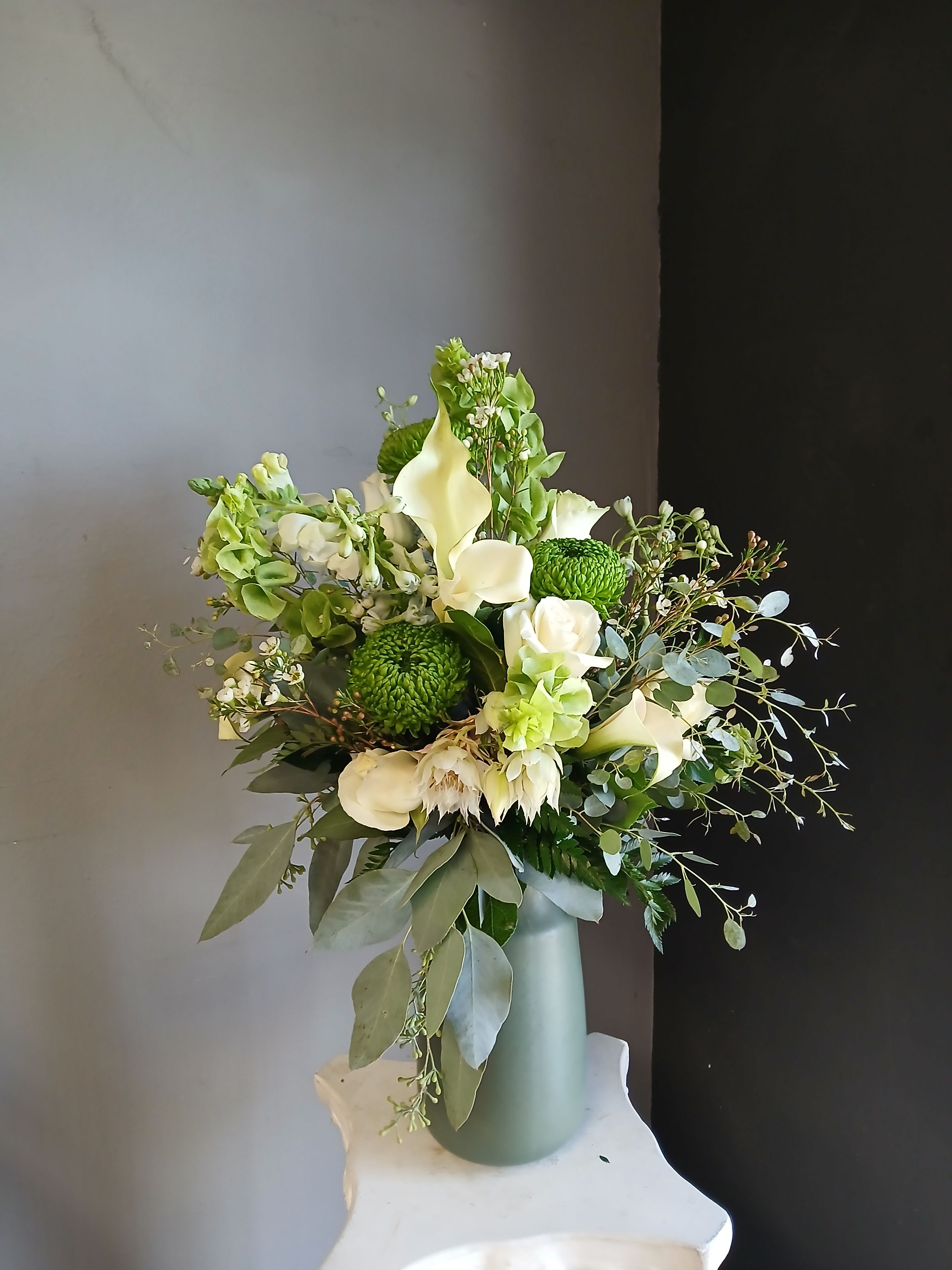 #717 Designer's Choice Vase Arrangement - This beautiful flower arrangement of fresh mixed seasonal blooms is made by local designers in the heart of Orange California. Hand crafted and perfect for every occasion, from birthdays and new babies to sympathy and just because. The best choice to show you are thinking of that special someone. Can be sent as a local delivery or in-store pickup. This is an original, one of a kind arrangement. Order now before it's too late!  UPGRADES: All upgrades are applied at the designer’s discretion and fulfilled to value using the freshest seasonal and/or premium flowers available. Container upgrades may be included when possible; otherwise, value is reflected in the floral selection while maintaining the original design style. 