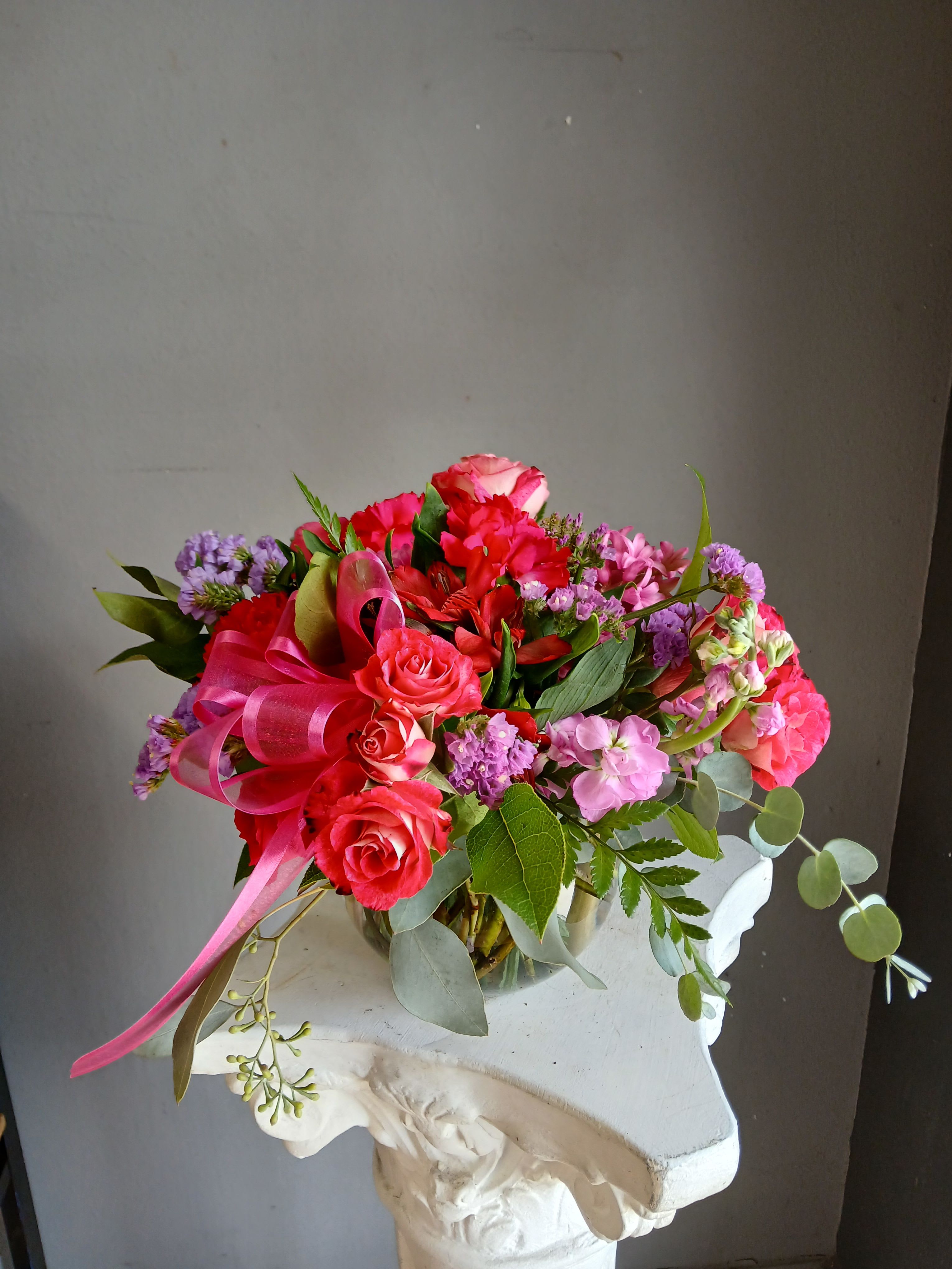 #705 Designer's Choice Vase Arrangement  - This beautiful flower arrangement of fresh mixed seasonal blooms is made by local designers in the heart Orange California. Hand crafted and perfect for every occasion, from birthdays and new babies to sympathy and just because. The best choice to show you are thinking of that special someone. Can be sent as a local delivery or in-store pickup. This is an original, one of a kind arrangement. Order now before it's too late!   All upgrades are applied at the designer’s discretion and fulfilled to value using the freshest seasonal and/or premium flowers available. Container upgrades may be included when possible; otherwise, value is reflected in the floral selection while maintaining the original design style.  
