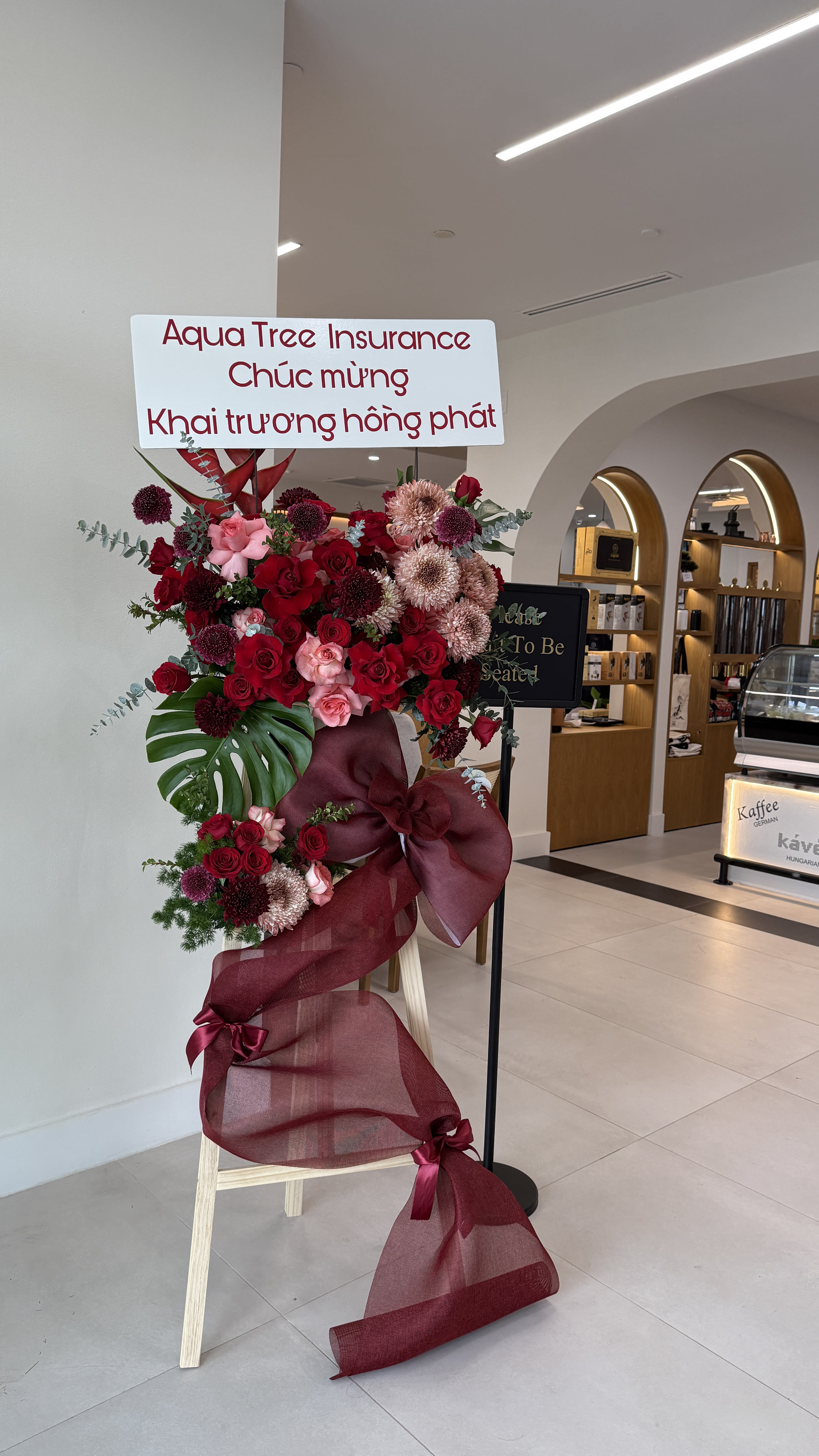 Abundant Success - Make a statement with our premium grand opening flowers. Designed with high-end blooms and a sophisticated style, this arrangement represents wealth, success, and a flourishing future.