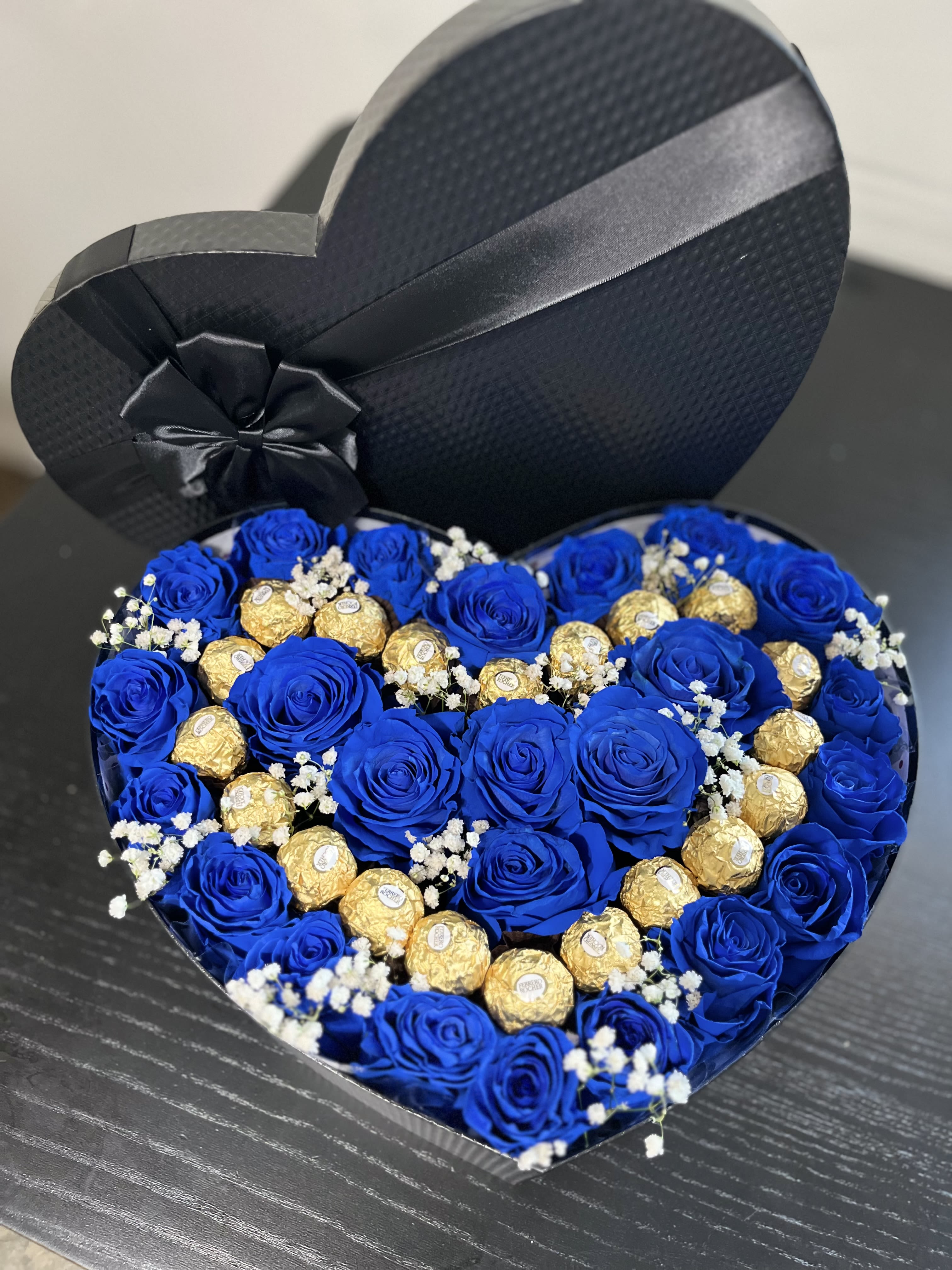 Chocolate Love Boxed Arrangement - Blue roses perfectly arranged with a heart of chocolates 