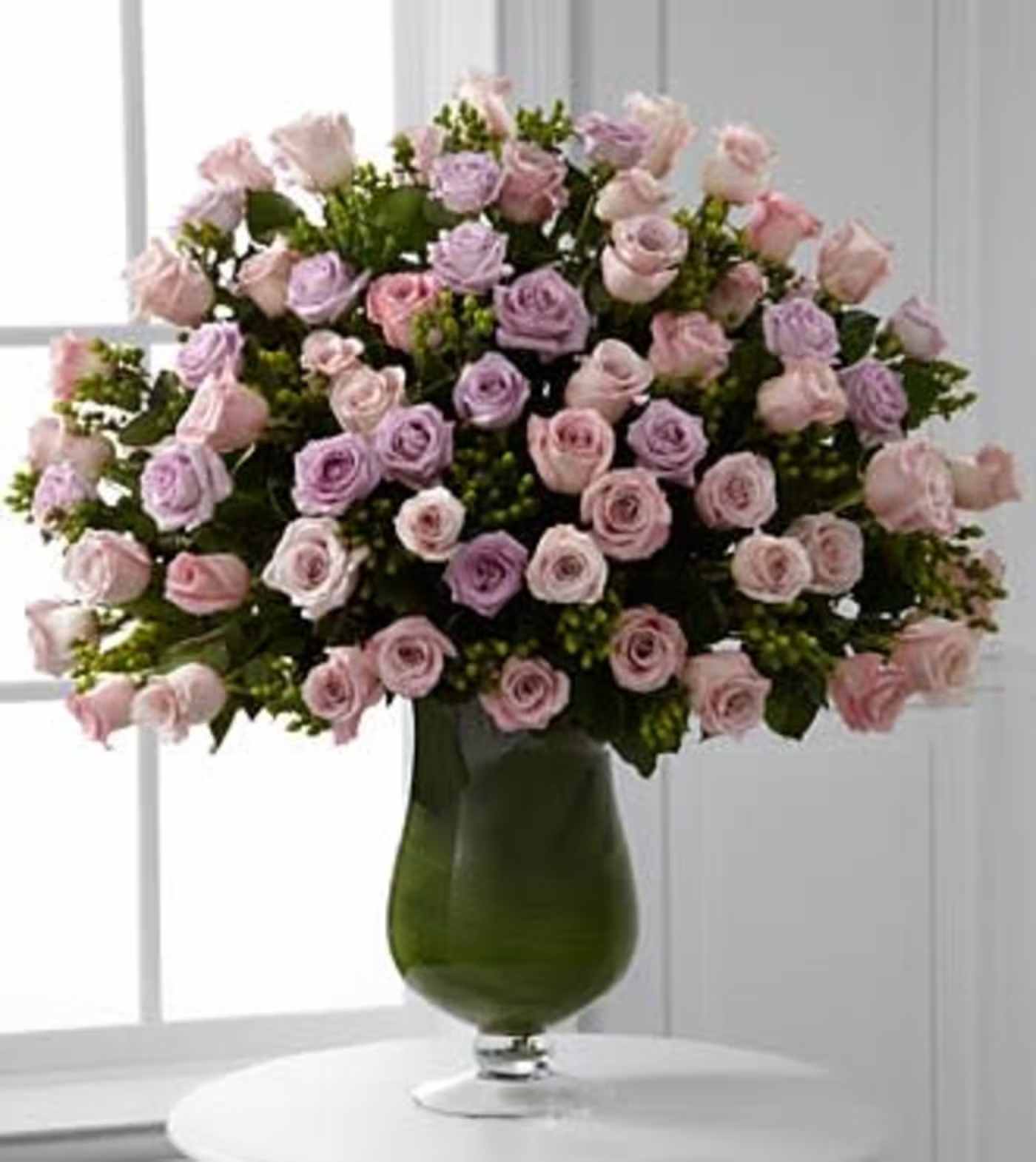 Applause Luxury Rose Bouquet - They are the star of your life, a force of love that is simply endless. Shower them with your praise and gratitude symbolized through our exquisite bouquet of pink and lavender 24-inch premium long-stemmed roses offering their abundance of swirling petals gorgeously situated in a highly elegant 16-inch clear glass pedestal vase.