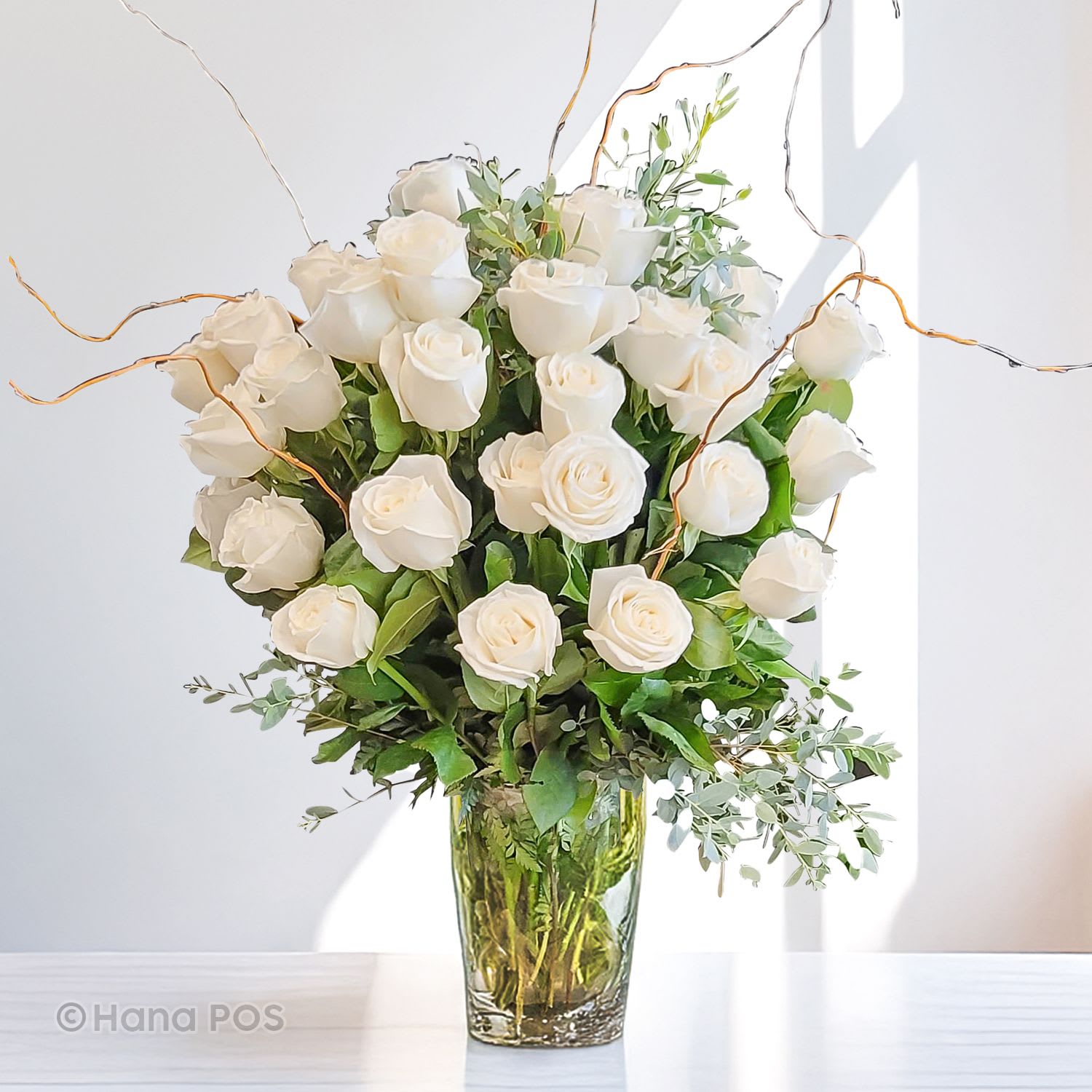 Pure Love - Pure white roses anyone? The sheer elegance and appeal of the Pure Love bouquet will blow your mind. With a bunch of milky white roses placed in a glass bud vase, the Pure Love bouquet is perfection all along! Get your mom this exquisite bouquet for Mother’s Day, send it to your significant other after a fight to apologize and call upon a peace truce, or just get it for yourself!
