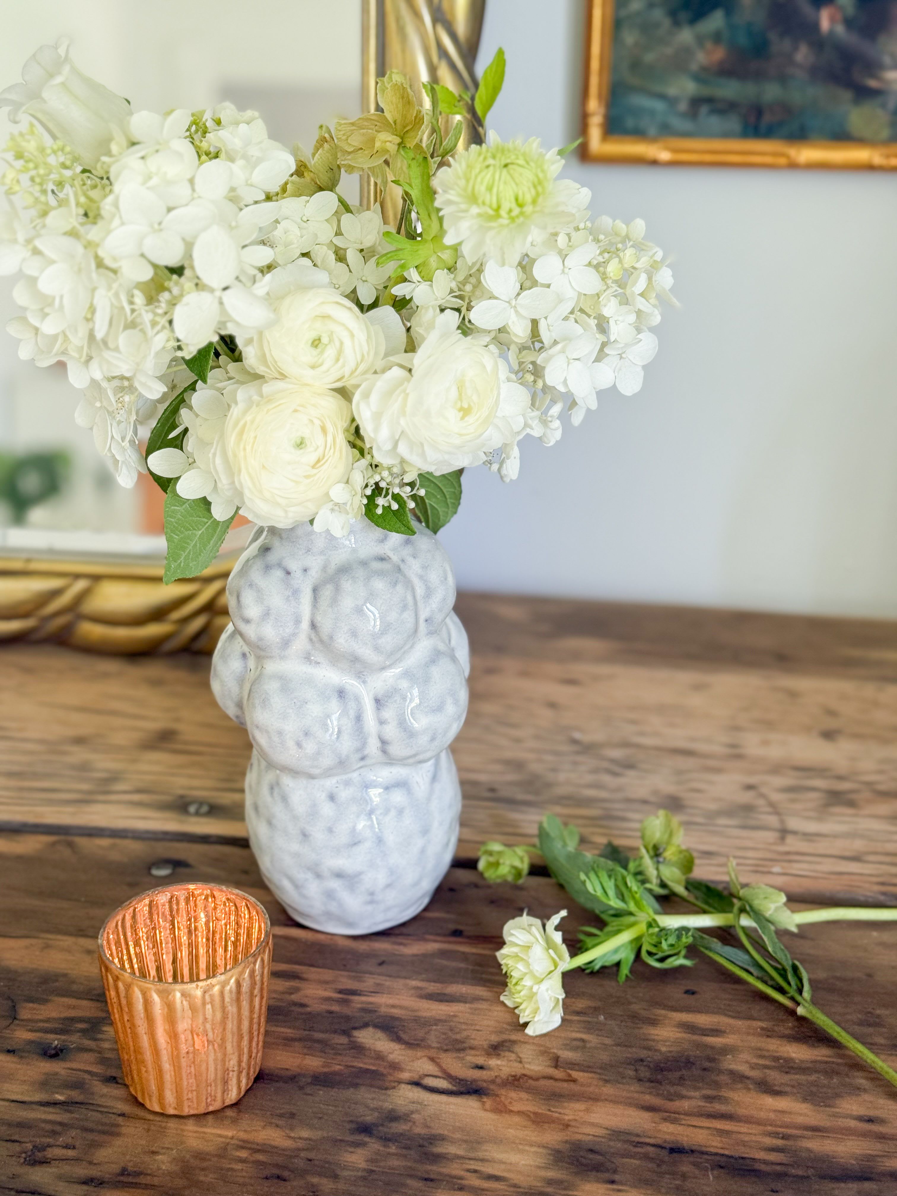 Camilla  - A delicate soft colored palette floral selection In a ceramic bubble large bud vase.  