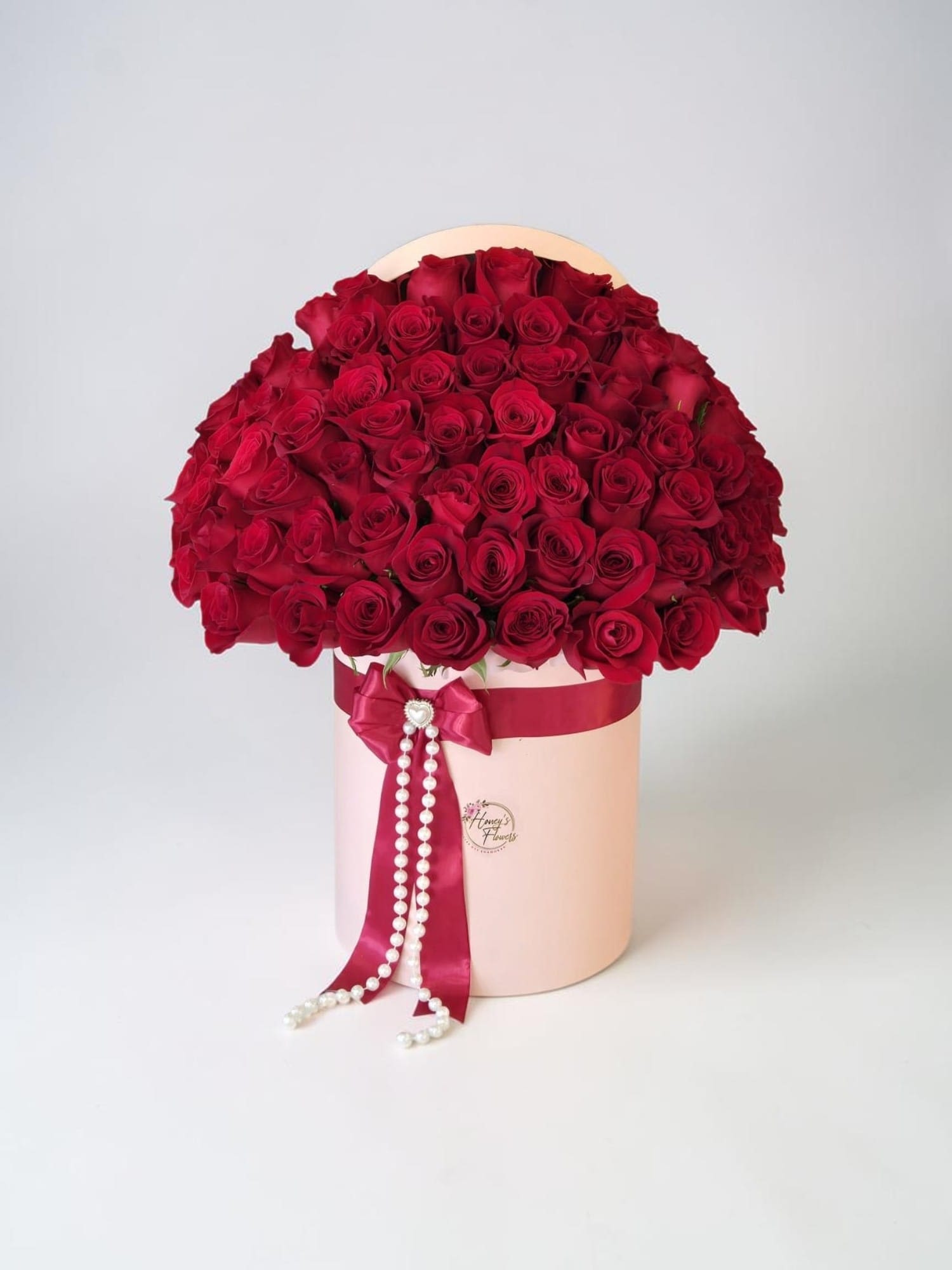 75 Red Roses Box - A timeless expression of love and elegance. Featuring premium red roses in a luxury box, beautifully arranged to make every moment unforgettable.