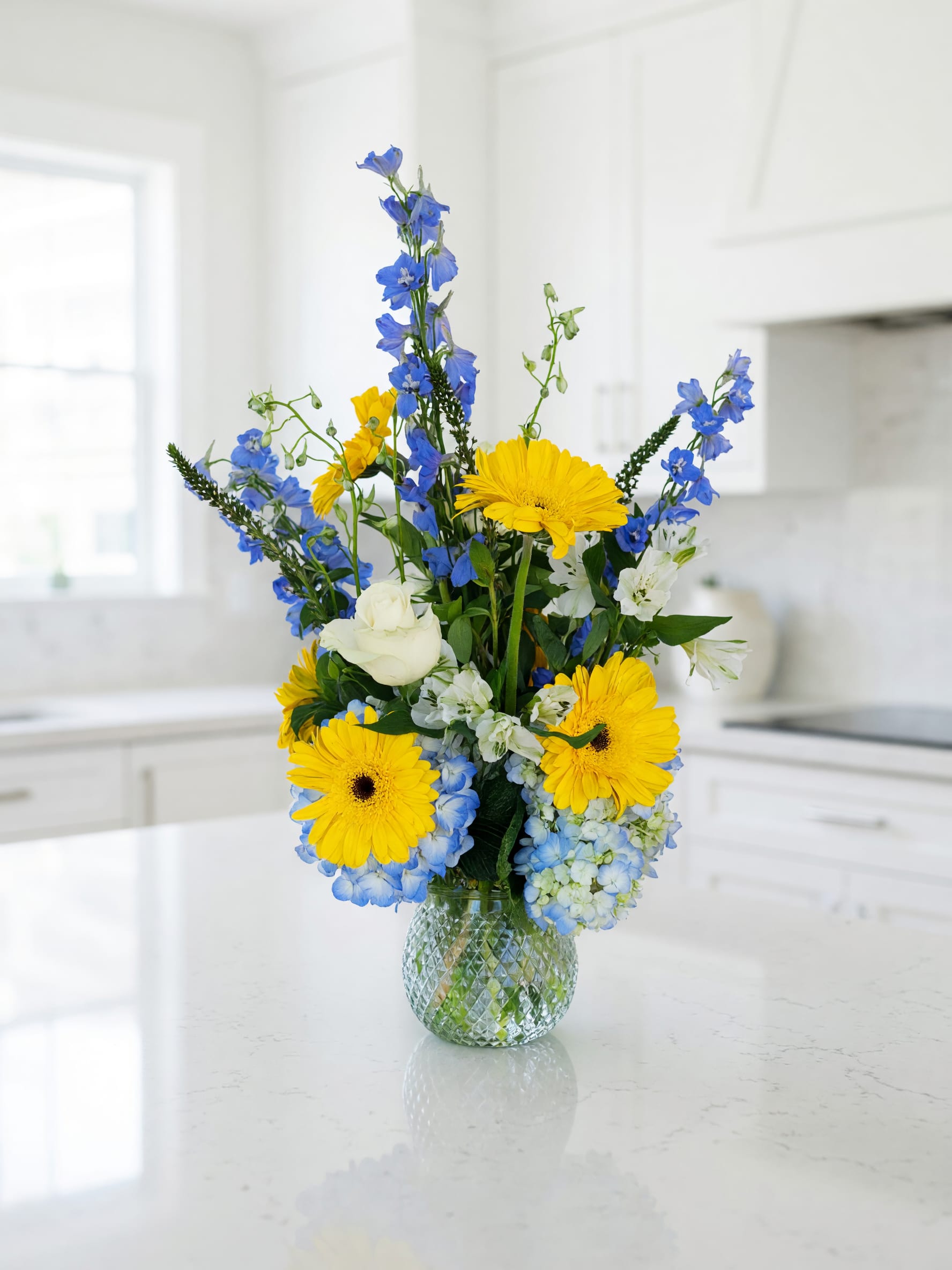 Blue garden  - hydrangeas gerbera daisies roses and delphinium. Tall arrangement 26 in height 