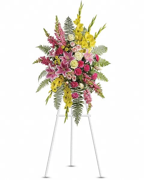 Rays of Light Spray - This stunning spray is a beautiful and touching display of your sympathy and devotion. A lovely composition of flowers such as green roses, gladioli and button spray chrysanthemums, pink spray roses and carnations, light pink oriental lilies and snapdragons are arranged with a mix of beautiful greenery in a standing spray of flowers that's delivered on an easel.