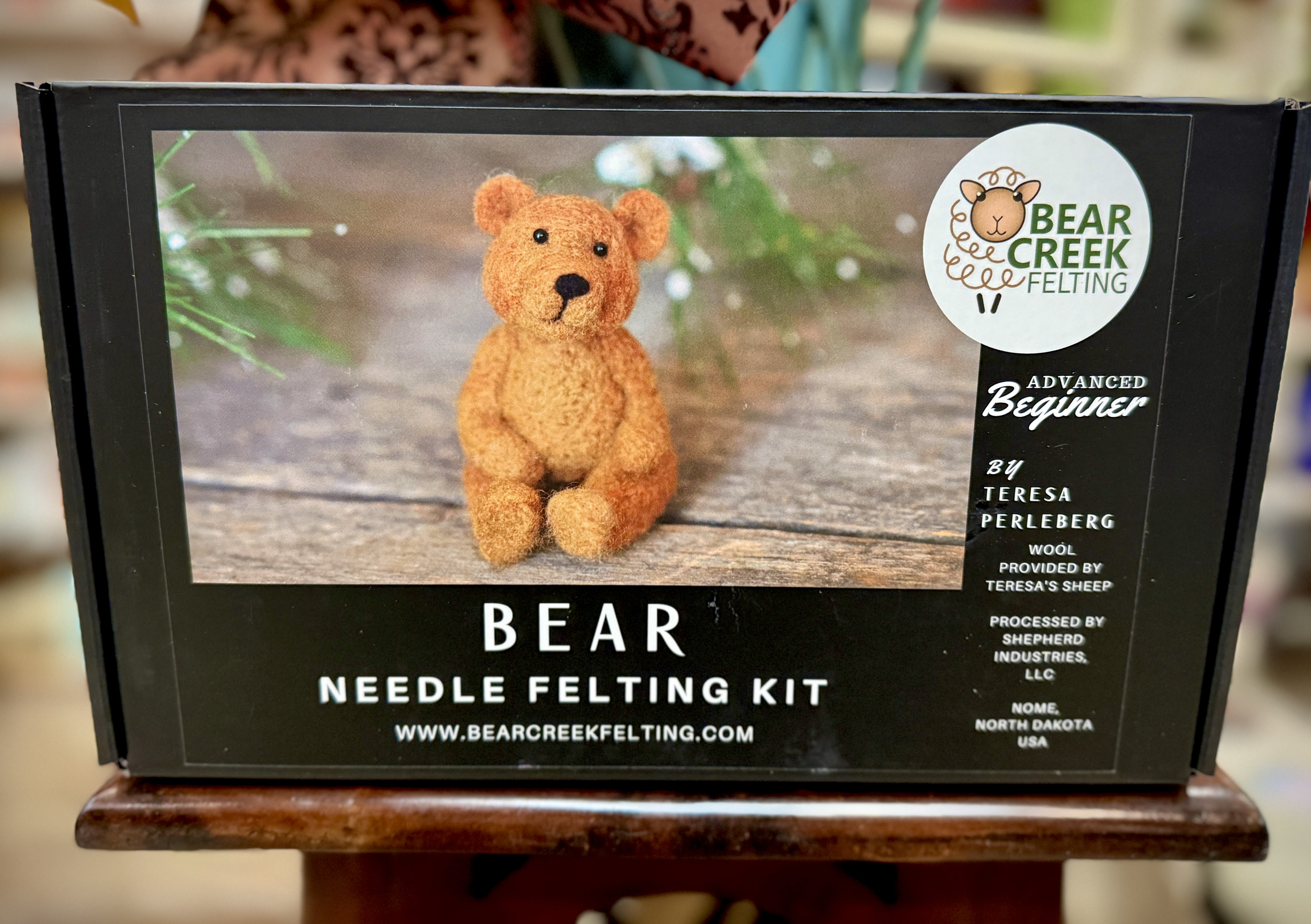 Bear needle felting kit box with a small felt bear pictured on the front