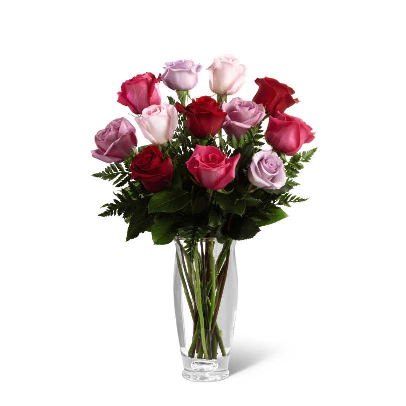  Captivating Color Rose Bouquet by Vera Wang - FTD proudly presents the Captivating Color Rose Bouquet by Vera Wang. When youve got the worlds most romantic designer imagining the flowers, you know the results are bound to be epic. Reflecting Vera Wangs understated but undeniable elegance, this exciting bouquet of our finest roses in shades of red, fuchsia, pale pink, light and deep lavender among lush greens is presented in a sleek, crystal clear glass vase with a subtle, sculptural flare. You can be confident that this bouquet will make you the star when you send it for Valentine's Day, Mother's Day, birthdays and anniversaries.