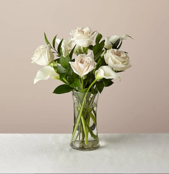 Vision in Ivory Rose and Calla Lily Bouquet - A stunning selection of roses and calla lilies come together to create this illuminating bouquet. Picked fresh from the farm, let this arrangement take center stage in your home and add a touch of elegance wherever it's placed.  The Original Bouquet is about 15"H by 13"W.