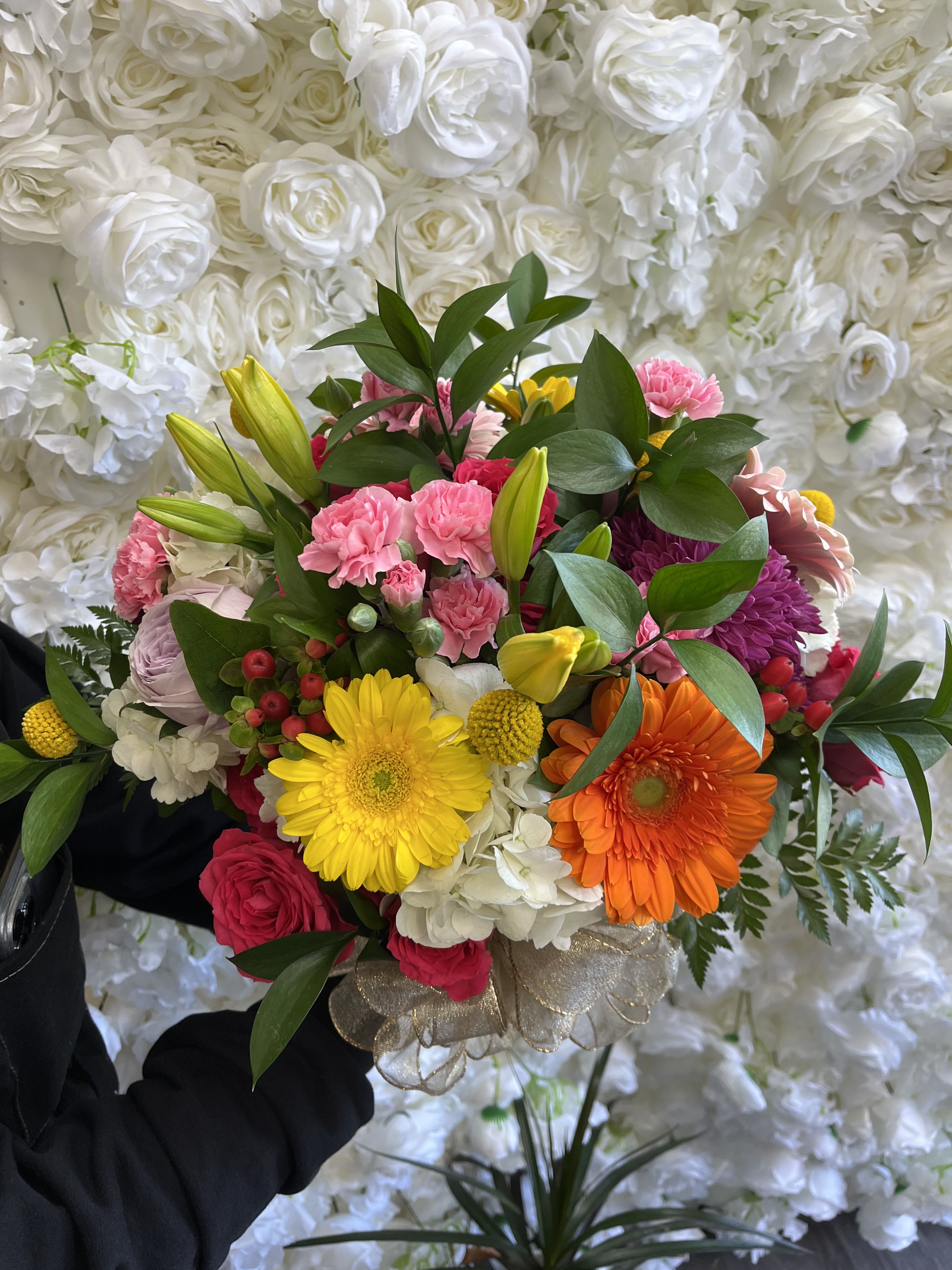 Colorful bouquet with gerbera daisies, roses, and carnations