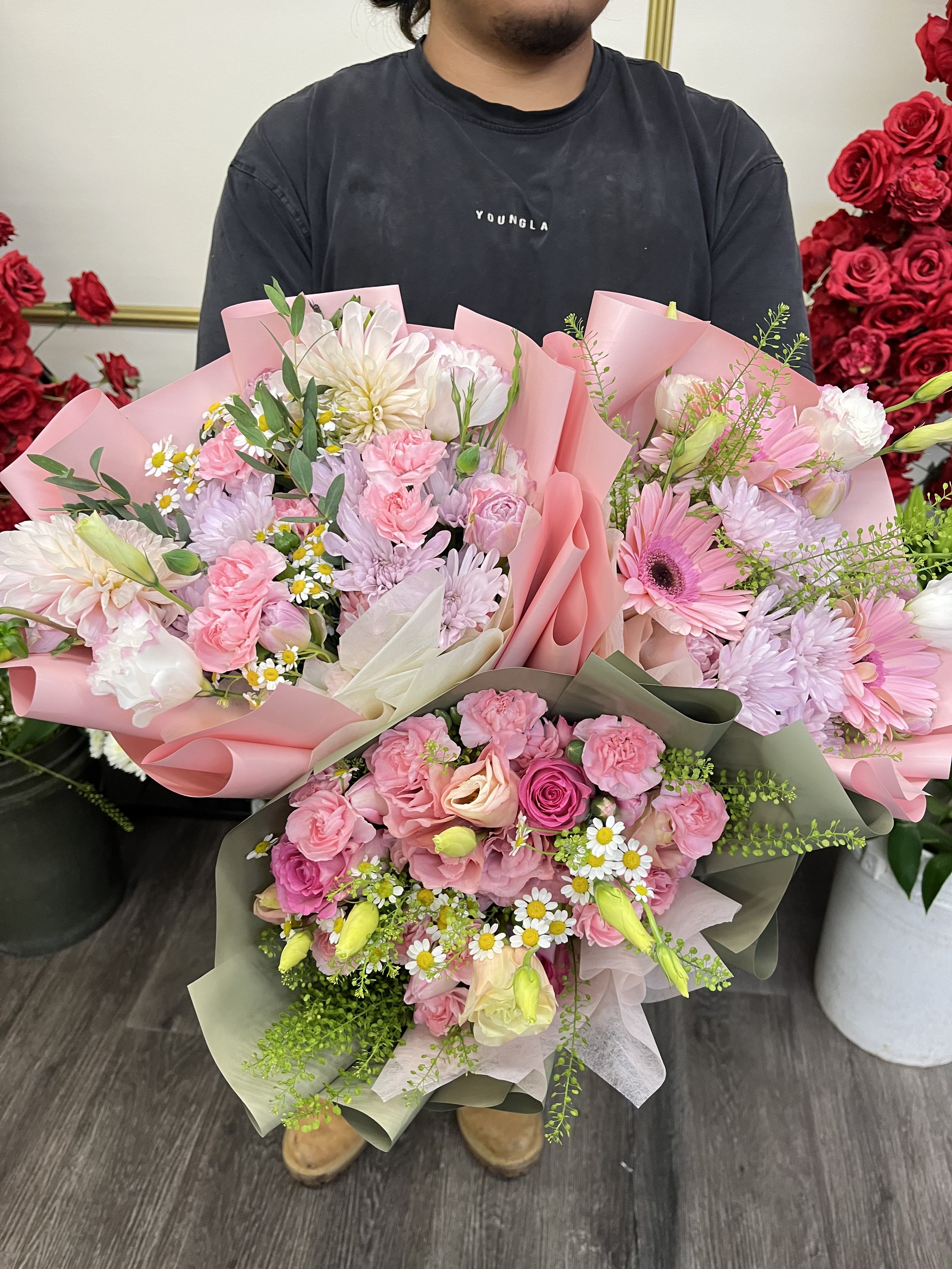 Florist choice-Spring pink mix - Florist choice, spring pink mix, features an assortment of seasonal florals wrapped in waterproof paper