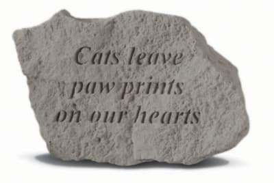 Engraved stone with the words "Cats leave paw prints on our hearts"