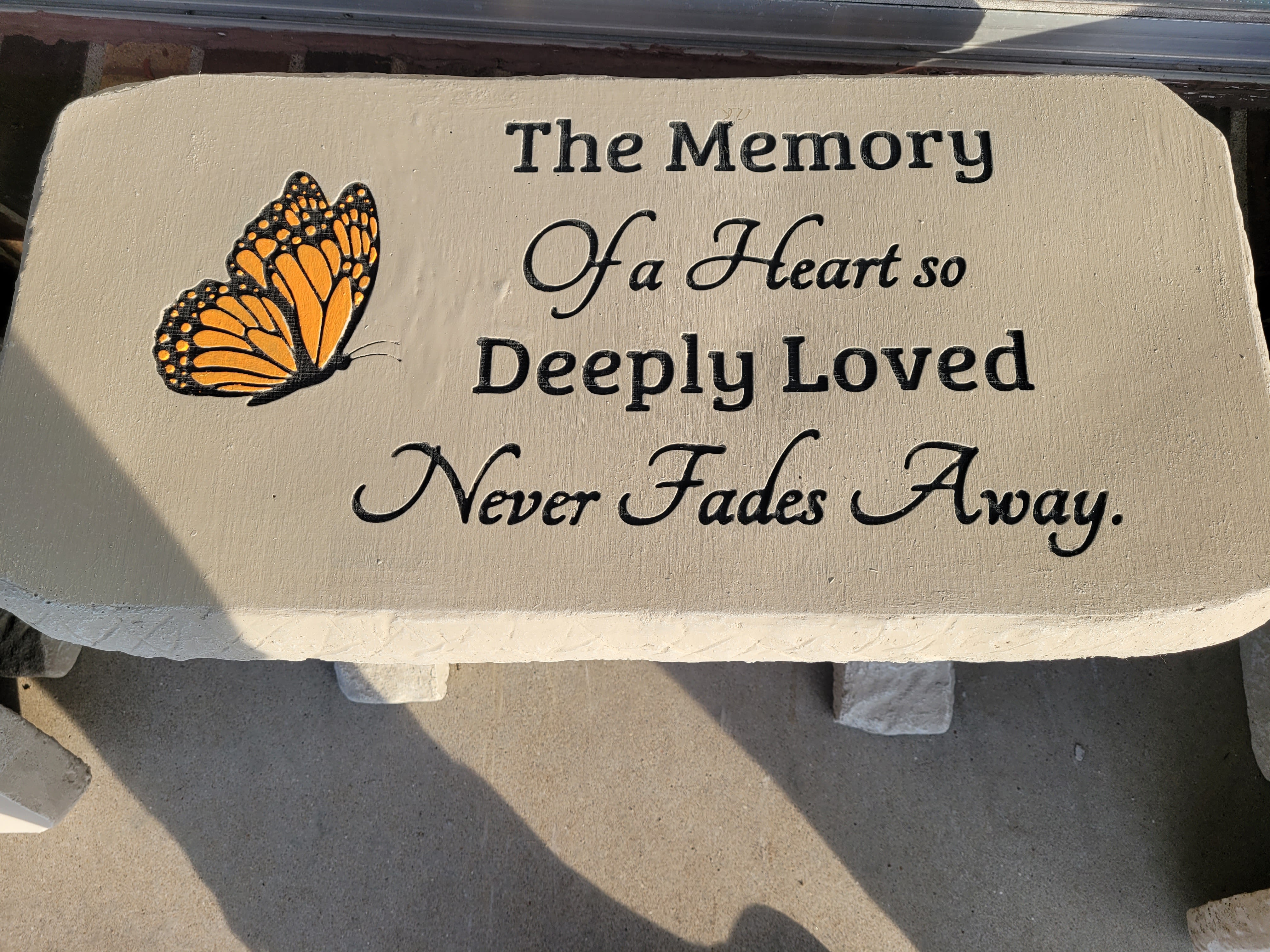 The Memory of a Heart Bench - Concrete bench with butterfly engraved. Butterfly color may vary based on availability