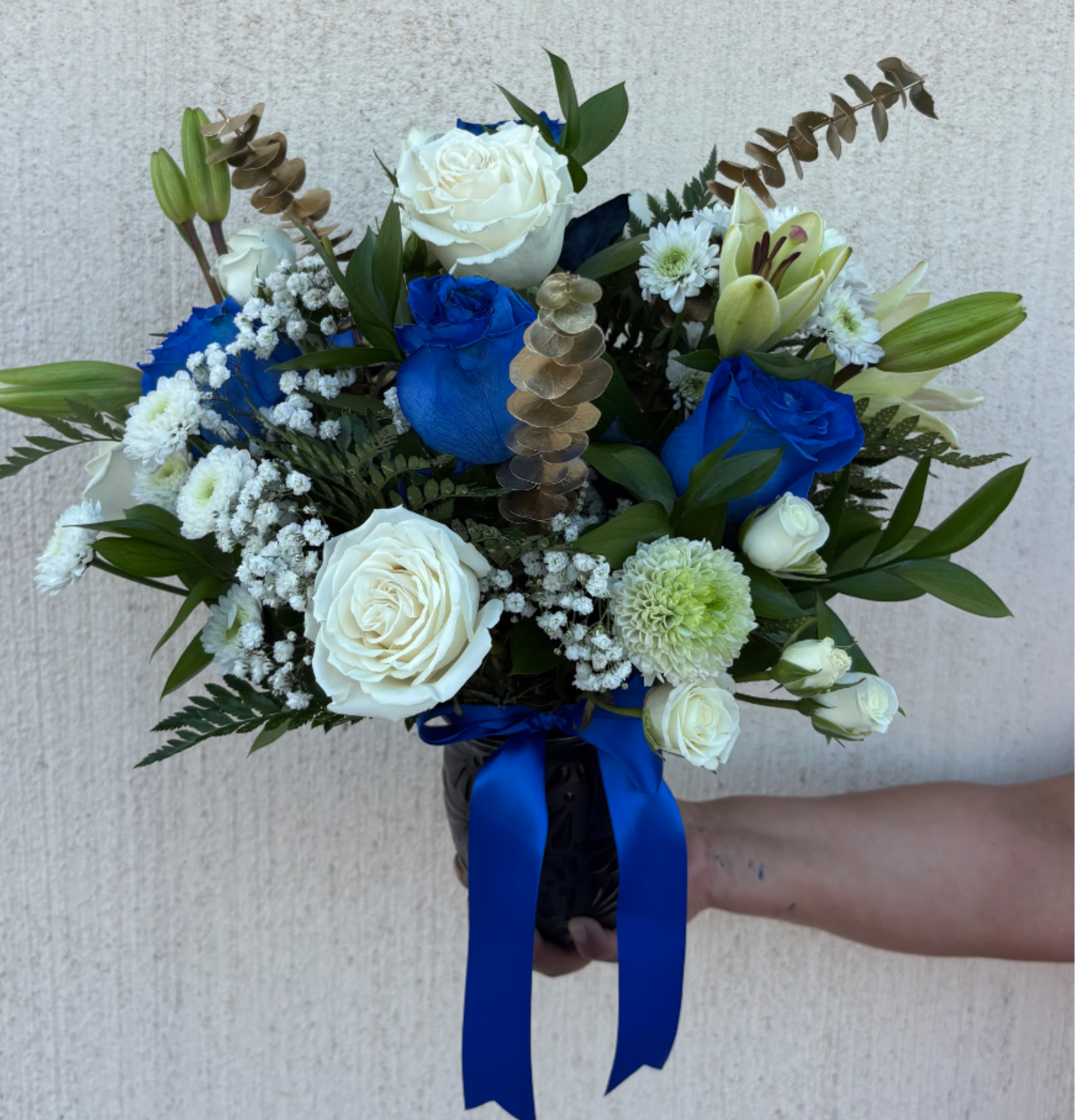 BLUE CANTARITO - Blue and Whie Rose Arrangement in a black Cantarito ( mexican reusable pot)