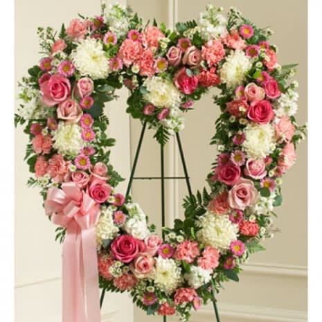 Shades of Pink Heart Wreath - This beautiful sympathy wreath is adorned with the freshest pink and white flowers . 