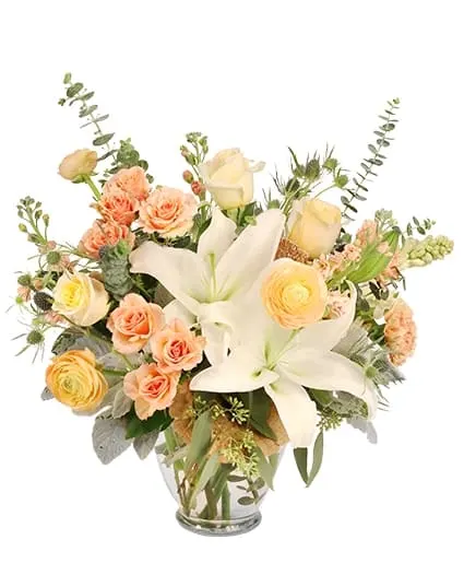 PLAYFUL PEACH FLOWER DESIGN  - Sprightly and cheerful, Playful Peach will have them smiling from ear to ear. Containing white lilies, peach ranunculus, dried mushrooms and more surprises, this bouquet makes a lovely gift. Order online or call us to place an order! 