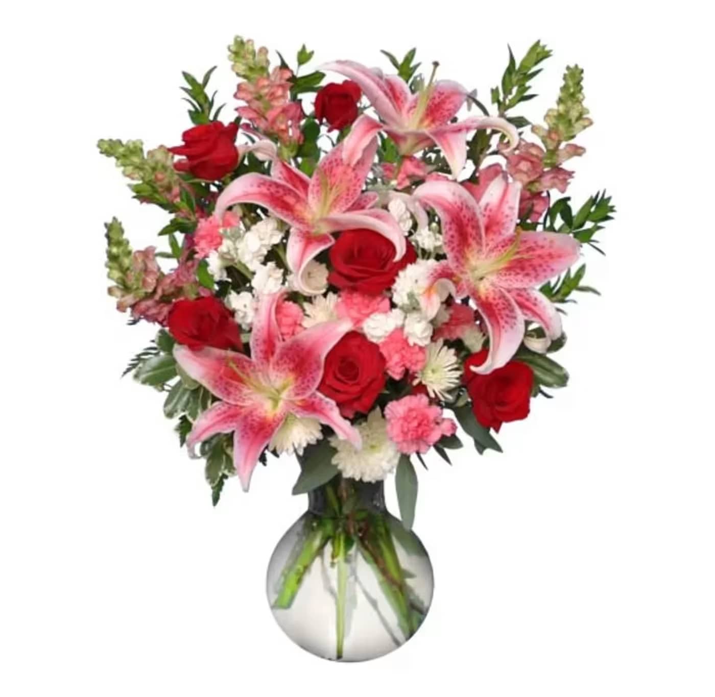 Bouquet of pink lilies and red roses in a glass vase