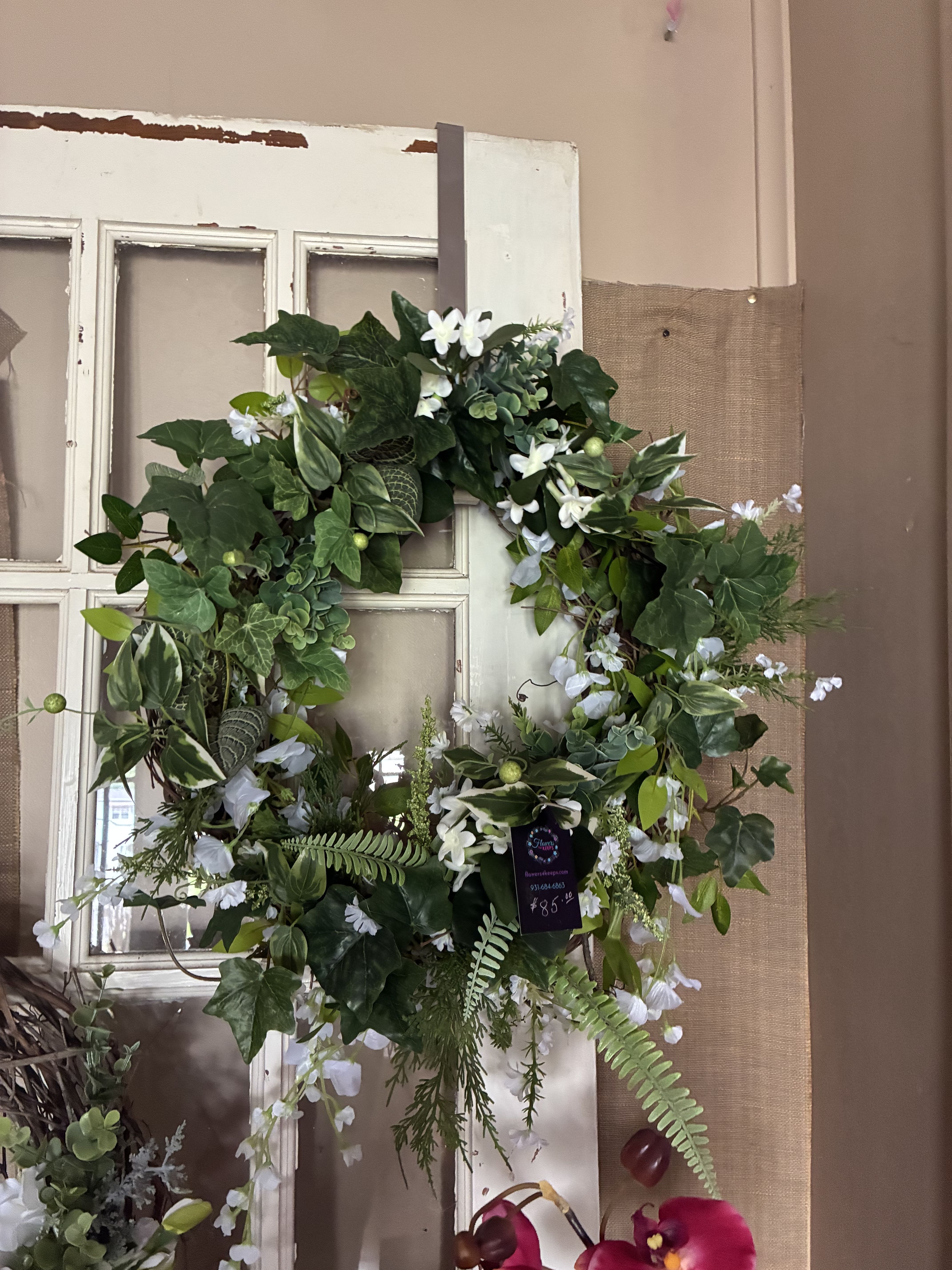 Springy Vines Wreath - A grapevine Wreath covered in the beautiful greens and mixed flowers such a trendy look to go with any decor.