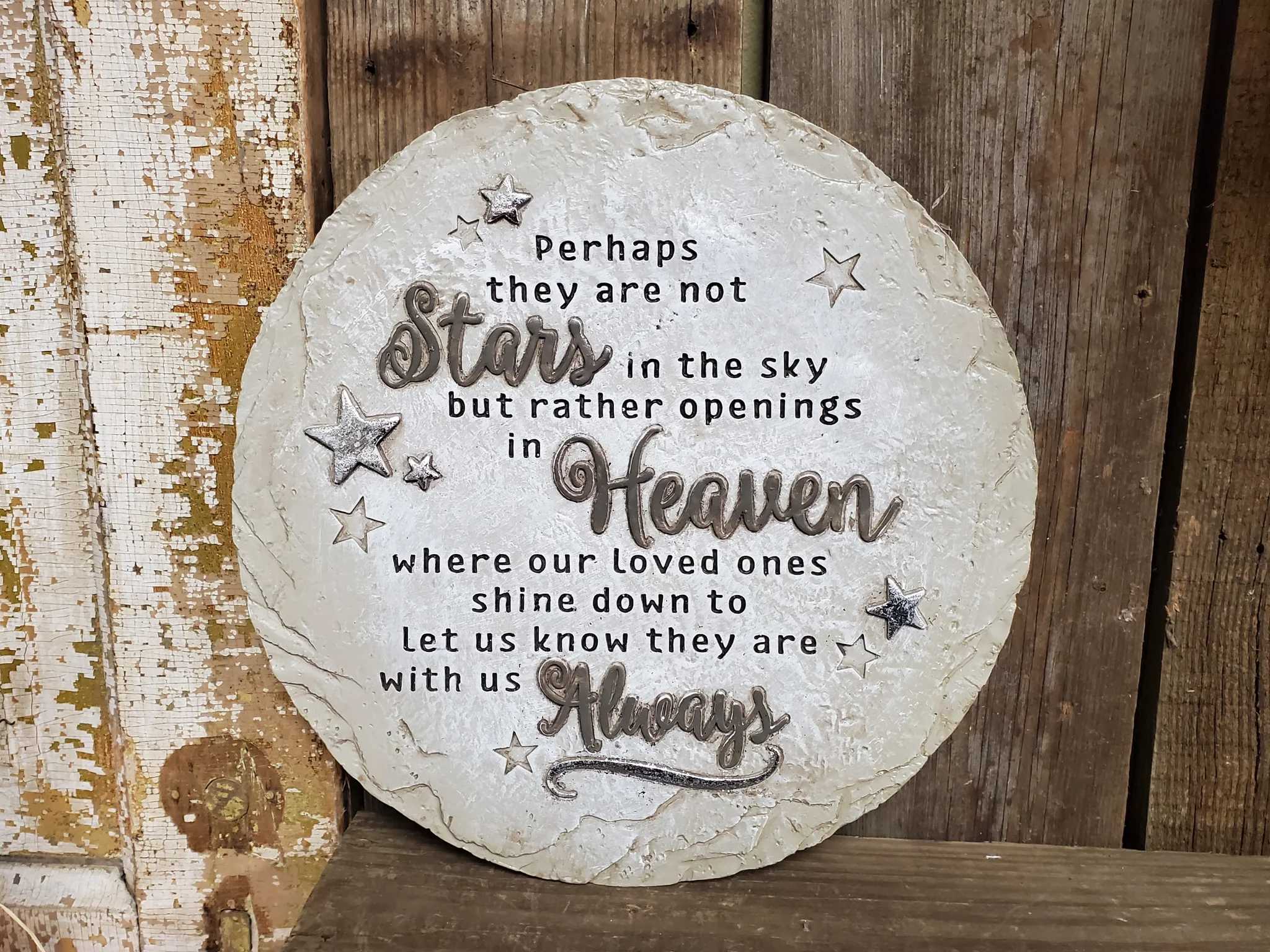Round memorial plaque with a star quote about loved ones in heaven