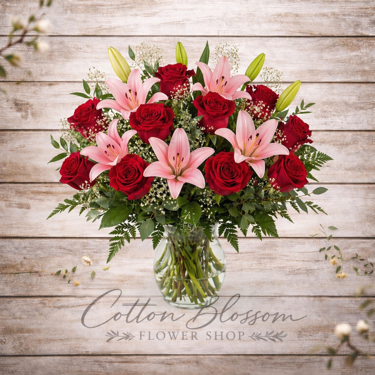 Endless Romance - Endless Romance – Red &amp; Pink Rose Anniversary Bouquet in Maricopa, AZ  Celebrate a love that grows deeper with time with our Endless Romance bouquet. This lavishly romantic arrangement brings together rich reds and soft pinks in a stunning display designed to express love, passion, and devotion.  Featuring radiant red roses, delicate spray roses, and beautiful pink Asiatic lilies, this elegant bouquet is artfully arranged in a stylish clear glass vase. The blend of classic red and blush tones creates a timeless and sentimental gift — perfect for anniversaries, romantic milestones, or simply saying “I love you.”  Size Options: • Standard – One dozen roses • Deluxe – One and a half dozen roses (18) for added fullness • Premium – Two dozen roses (24) for a luxurious, breathtaking presentation  Each arrangement is hand-crafted in Cotton Blossom Flower Shop’s signature style using premium fresh blooms for a full, balanced, and long-lasting design.  Cotton Blossom Flower Shop proudly offers same-day flower delivery in Maricopa, Casa Grande, and Stanfield, Arizona. Order online today and send a beautiful expression of lasting love from your trusted local Maricopa florist.
