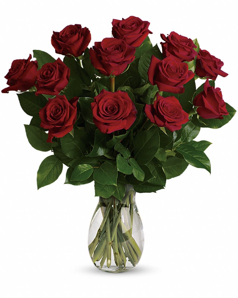 Bouquet of red roses in a clear glass vase