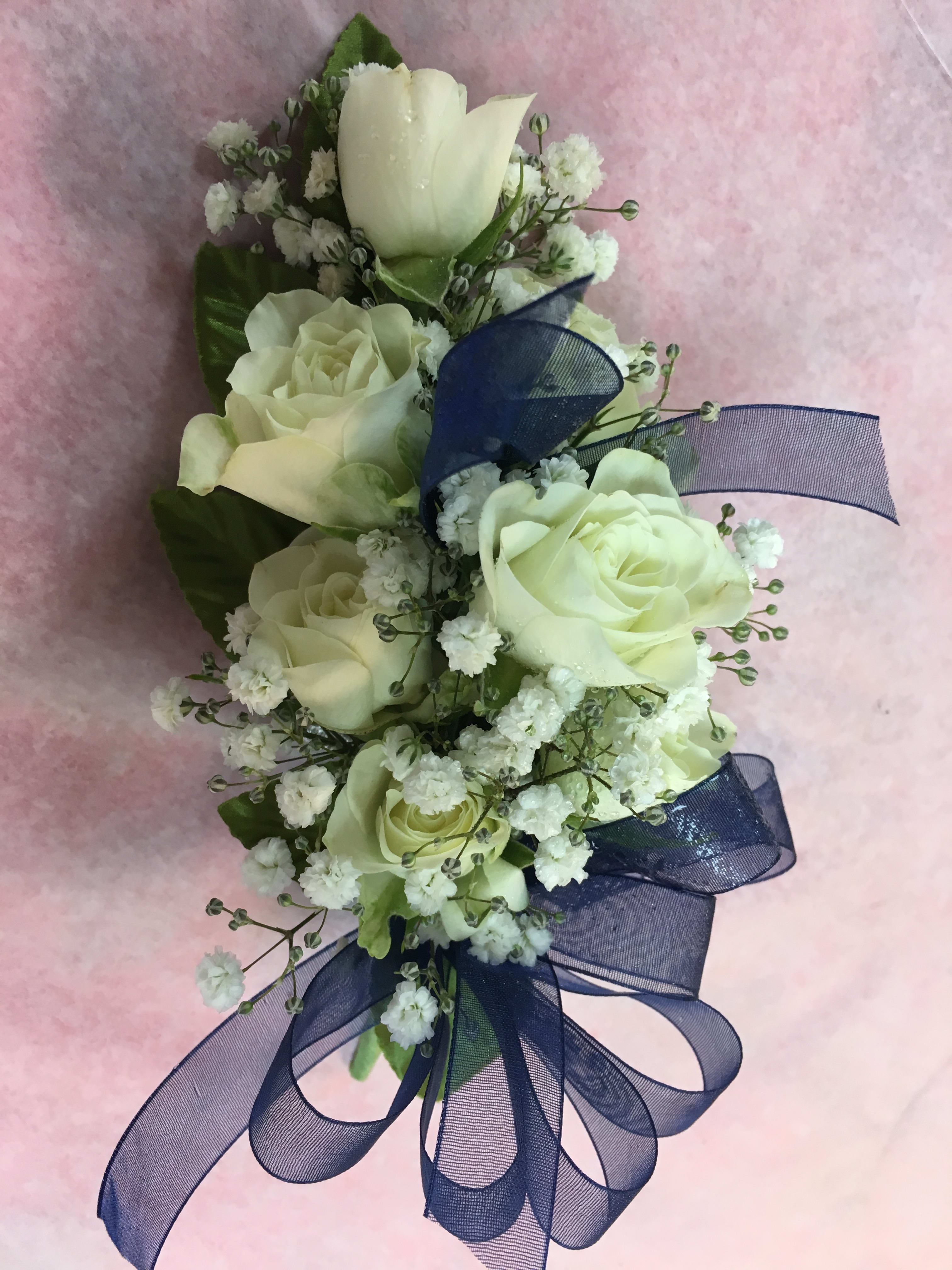  Spray Roses Wristlet -  Spray Roses, Greens.   Specify Spray Rose Color if available.  Color of dress can be added to Special Instructions for Ribbon Choice ( As Close as possible) Call  908-234-2900  for assistance.