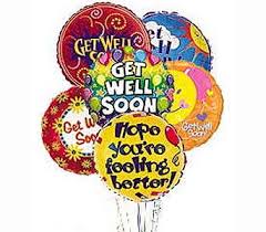 Cluster of colorful get-well balloons with messages