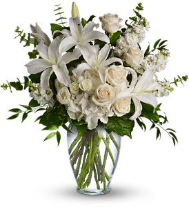Dreams From the Heart Bouquet - A lovely bouquet to soothe and comfort, a variety of white and peach blossoms sends your hope and strength. Beautifully.  Beautiful flowers such as white hydrangea, spray roses and stock, peach roses, eucalyptus and more fill a tall glass vase.  Approximately 24" W x 24 1/2" H  Orientation: One-Sided 