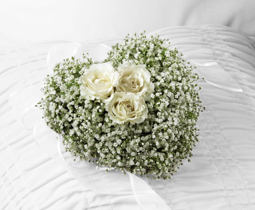 FTD Splendid Grace Casket Assortment - The FTD Splendid Grace Casket Adornment is a sweet and elegant  tribute to a life well-lived. A perfect remembrance presented from the  children of the family, this casket adornment consisting of three white  spray roses surrounded by baby's breath, will add to the beauty and  grace of their memorial service.   8h x 7w