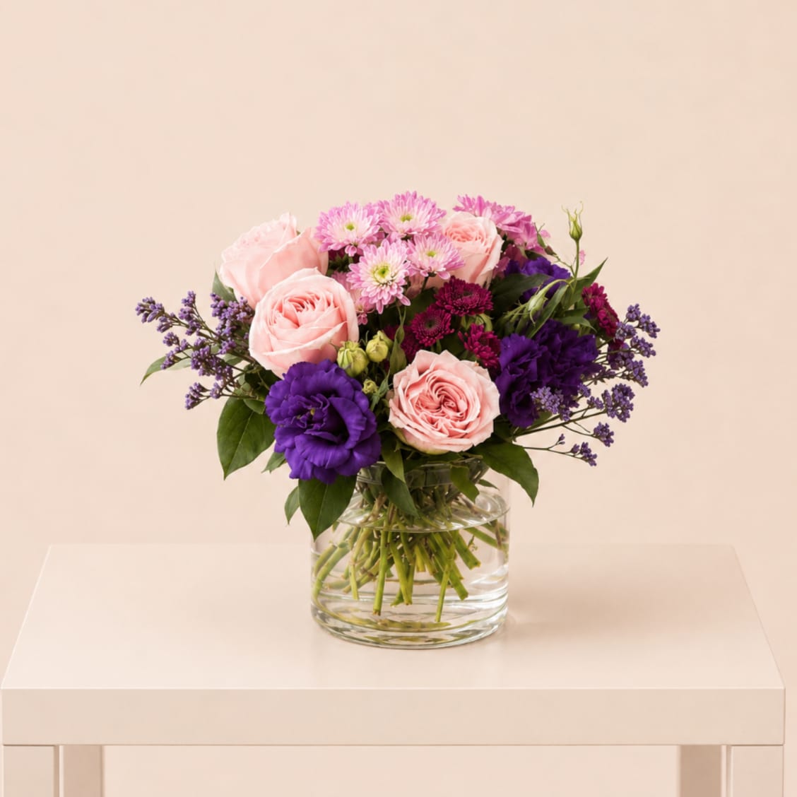Sweet Purple - A selection of pink and purple flowers come together in an eye-pleasing arrangement. This arrangement makes a great gift for Mother's Day, Women's Day, or as a thinking of you present.  Each piece is Designer’s Choice, created with fresh seasonal blooms. Flowers and colors may vary based on availability while maintaining the overall style and quality.  Better for: Valentine’s Day,  Birthdays, Mother’s Day, Women’s Day, anniversaries, thank you, new baby, thinking of you, Anniversary, Romantic Gestures, Congratulations, Just Because. 