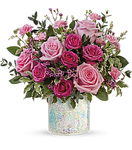 Pink roses and carnations in a mosaic glass vase
